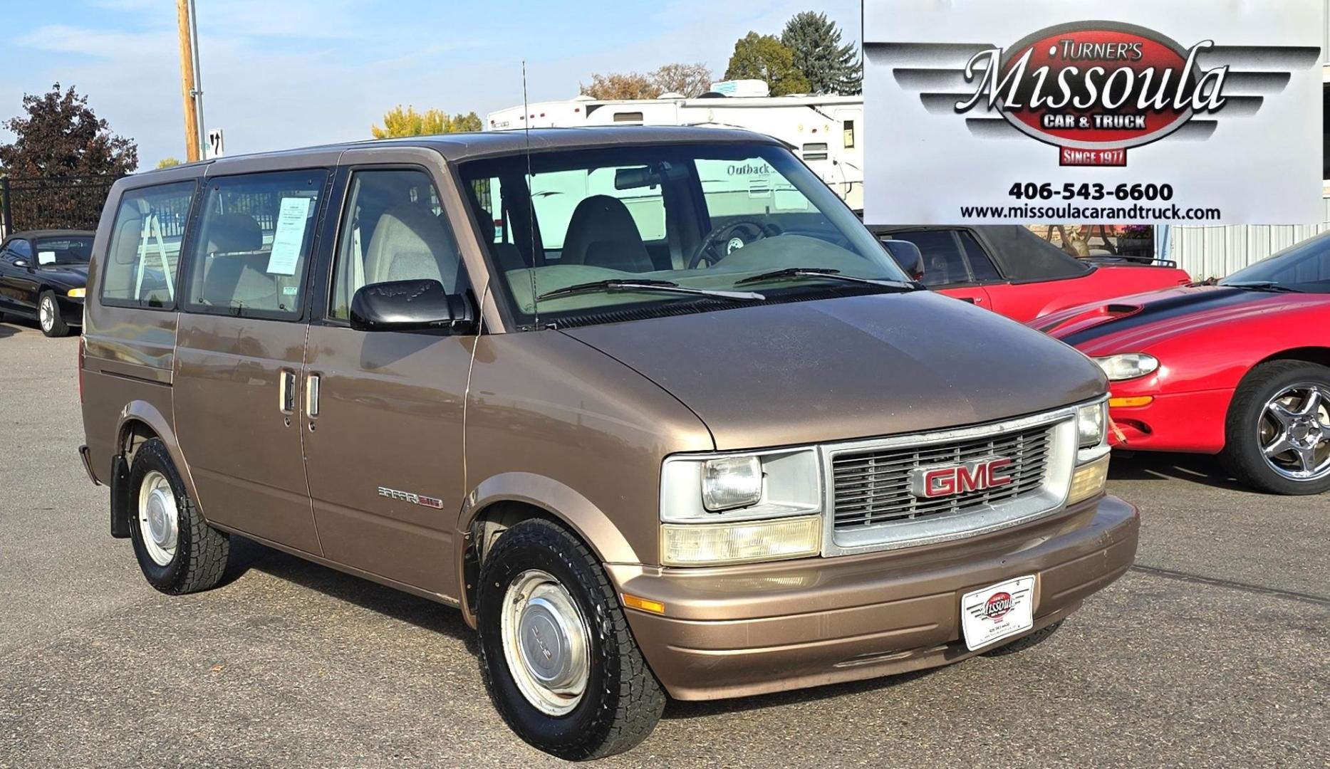 1999 Gold /Tan GMC Safari Passenger Van AWD (1GKEL19WXXB) with an 4.3L V6 OHV 12V engine, 4-Speed Automatic Overdrive transmission, located at 450 N Russell, Missoula, MT, 59801, (406) 543-6600, 46.874496, -114.017433 - Photo#7