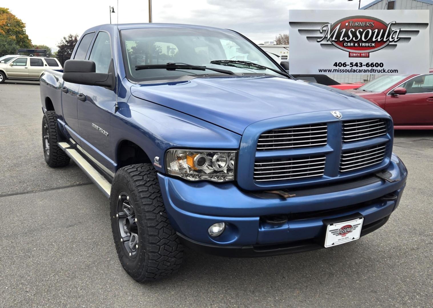 2003 Blue /Black Dodge Ram 2500 Laramie Quad Cab Long Bed 4WD (3D7KU28C13G) with an 5.9L L6 OHV 24V TURBO DIESEL engine, 6 Speed Manual transmission, located at 450 N Russell, Missoula, MT, 59801, (406) 543-6600, 46.874496, -114.017433 - Photo#2