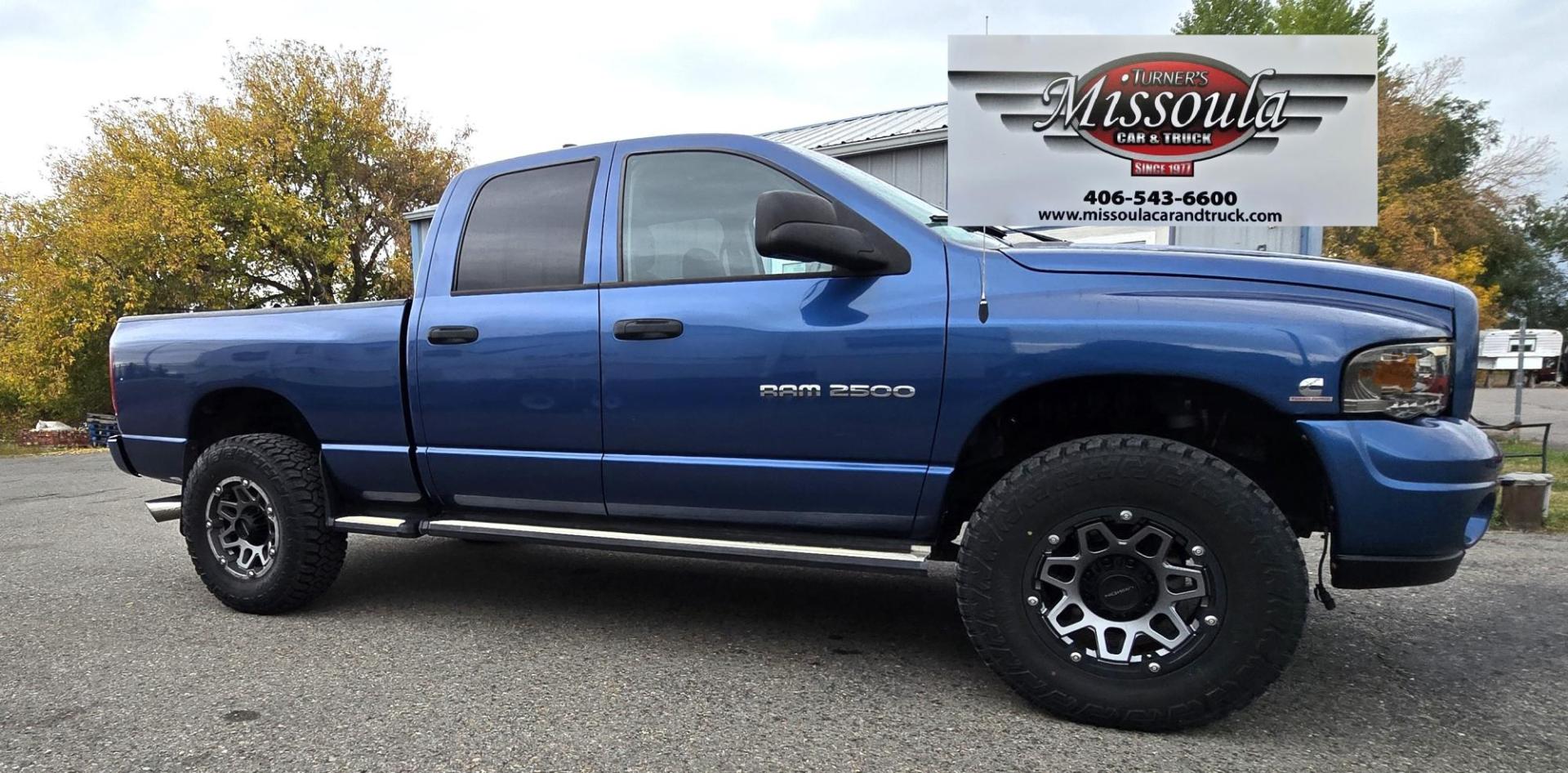 2003 Blue /Black Dodge Ram 2500 Laramie Quad Cab Long Bed 4WD (3D7KU28C13G) with an 5.9L L6 OHV 24V TURBO DIESEL engine, 6 Speed Manual transmission, located at 450 N Russell, Missoula, MT, 59801, (406) 543-6600, 46.874496, -114.017433 - Nice 5.9 Diesel 4WD Pickup. Hard to find 6 Speed Manual Transmission. Great Miles for it's age. Air Cruise. Tilt. Power Windows and Locks. Power Drivers Seat. Running Boards. Nice Tires and Wheels. Towing. Because of the age of this vehicle, financing is NOT available. - Photo#8