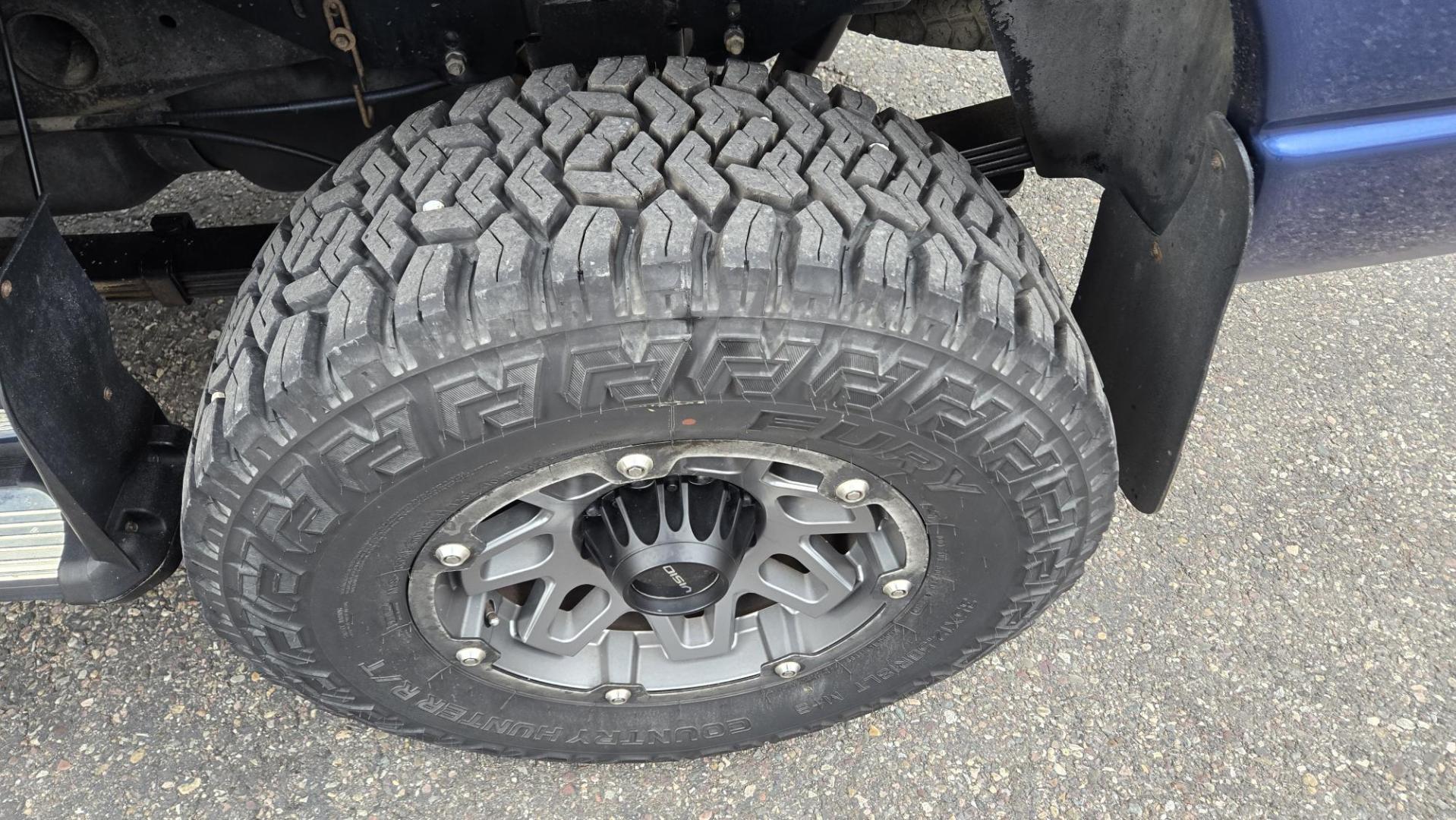 2003 Blue /Black Dodge Ram 2500 Laramie Quad Cab Long Bed 4WD (3D7KU28C13G) with an 5.9L L6 OHV 24V TURBO DIESEL engine, 6 Speed Manual transmission, located at 450 N Russell, Missoula, MT, 59801, (406) 543-6600, 46.874496, -114.017433 - Photo#14