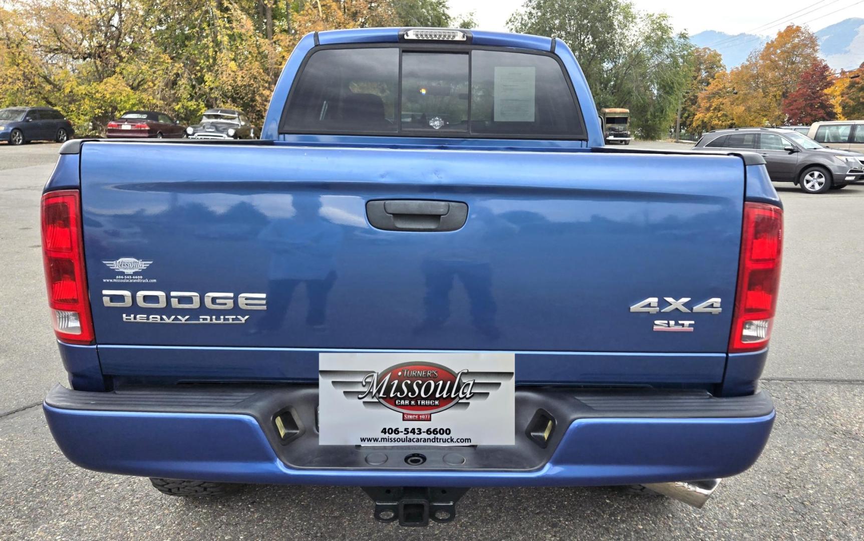 2003 Blue /Black Dodge Ram 2500 Laramie Quad Cab Long Bed 4WD (3D7KU28C13G) with an 5.9L L6 OHV 24V TURBO DIESEL engine, 6 Speed Manual transmission, located at 450 N Russell, Missoula, MT, 59801, (406) 543-6600, 46.874496, -114.017433 - Nice 5.9 Diesel 4WD Pickup. Hard to find 6 Speed Manual Transmission. Great Miles for it's age. Air Cruise. Tilt. Power Windows and Locks. Power Drivers Seat. Running Boards. Nice Tires and Wheels. Towing. Because of the age of this vehicle, financing is NOT available. - Photo#6