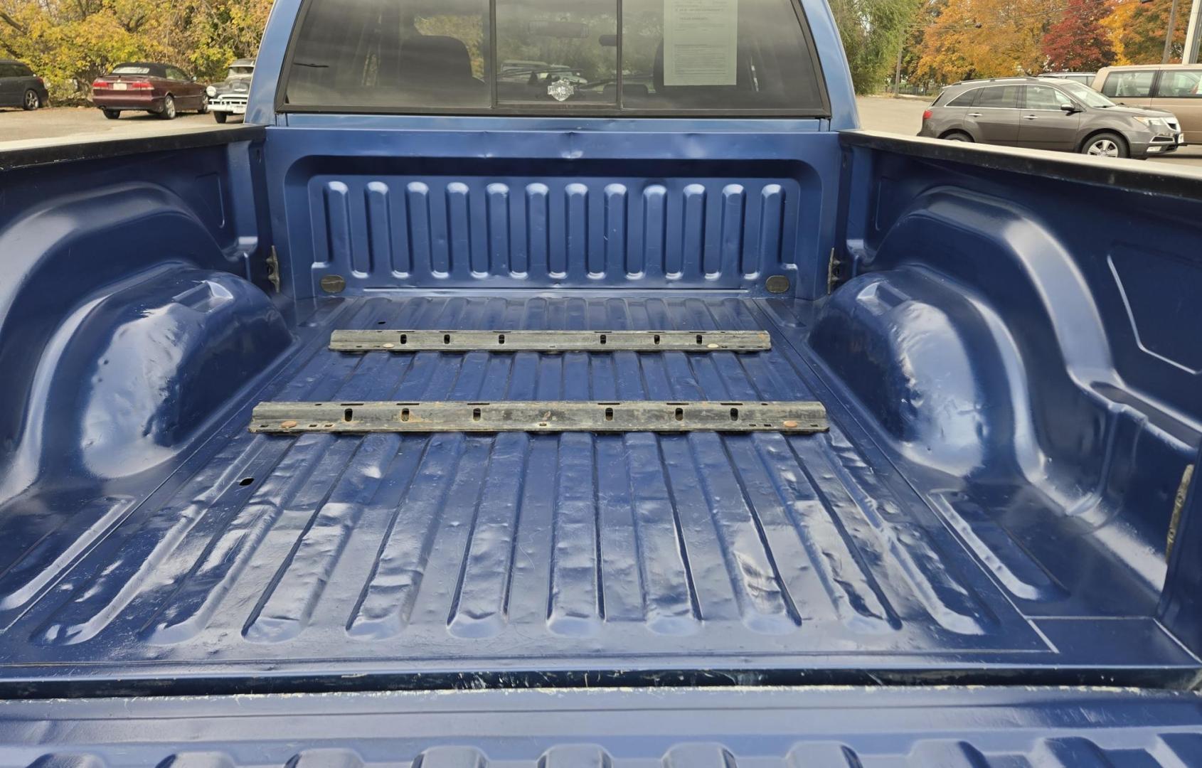 2003 Blue /Black Dodge Ram 2500 Laramie Quad Cab Long Bed 4WD (3D7KU28C13G) with an 5.9L L6 OHV 24V TURBO DIESEL engine, 6 Speed Manual transmission, located at 450 N Russell, Missoula, MT, 59801, (406) 543-6600, 46.874496, -114.017433 - Photo#9