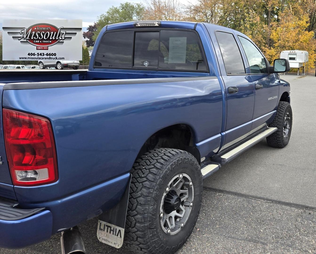 2003 Blue /Black Dodge Ram 2500 Laramie Quad Cab Long Bed 4WD (3D7KU28C13G) with an 5.9L L6 OHV 24V TURBO DIESEL engine, 6 Speed Manual transmission, located at 450 N Russell, Missoula, MT, 59801, (406) 543-6600, 46.874496, -114.017433 - Photo#4