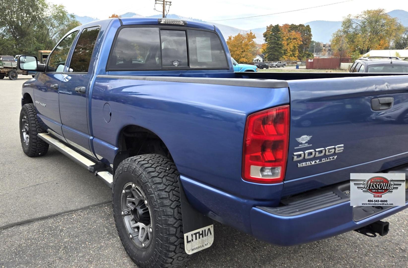 2003 Blue /Black Dodge Ram 2500 Laramie Quad Cab Long Bed 4WD (3D7KU28C13G) with an 5.9L L6 OHV 24V TURBO DIESEL engine, 6 Speed Manual transmission, located at 450 N Russell, Missoula, MT, 59801, (406) 543-6600, 46.874496, -114.017433 - Photo#5