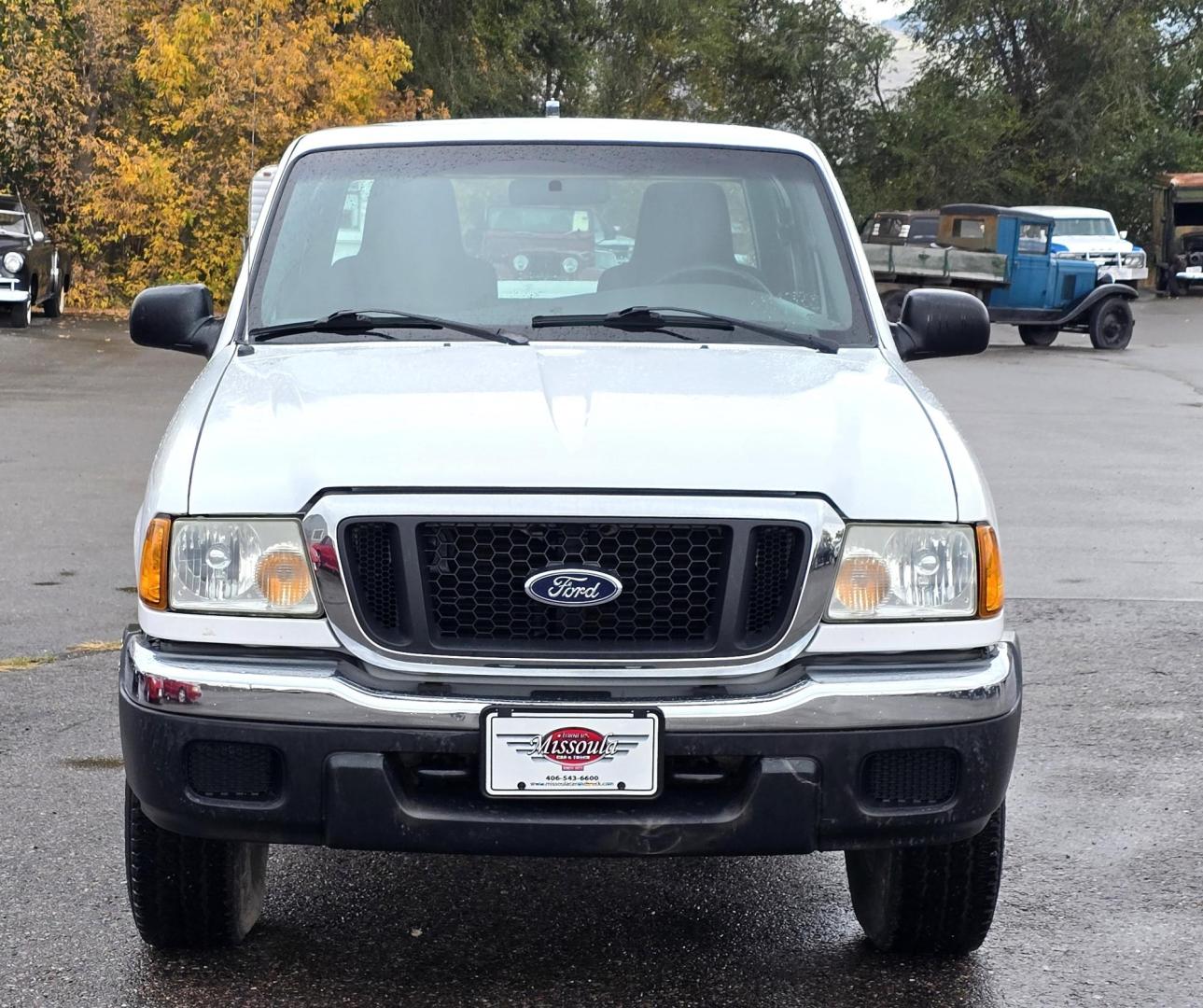 2004 White /Black Ford Ranger XLT SuperCab 2-Door 4WD (1FTYR15E64P) with an 4.0L V6 SOHC 12V engine, Automatic transmission, located at 450 N Russell, Missoula, MT, 59801, (406) 543-6600, 46.874496, -114.017433 - Low Mile 4WD Ranger. 4.0L V6 Engine. Automatic Transmission. Air conditioning. AM FM CD Player. 2 Owner. Clean Title and Carfax. Because of the age, financing is not available on this vehicle. - Photo#6