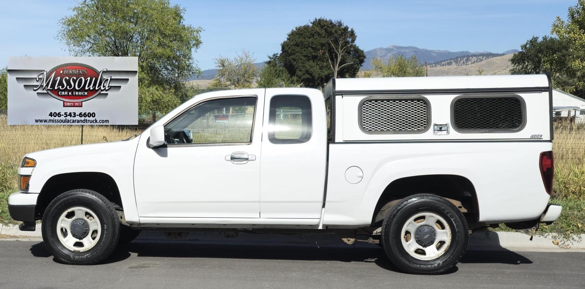 2012 White /Black Chevrolet Colorado Work Truck Ext. Cab 4WD (1GCJTBF95C8) with an 2.9L L4 DOHC 16V engine, Automatic transmission, located at 450 N Russell, Missoula, MT, 59801, (406) 543-6600, 46.874496, -114.017433 - Hard to find Colorado 4WD. 2.9L I4 Engine. Automatic. Former Animal Control Truck so it has a really nice Topper. Air Conditioning. Power Windows and Locks. Cruise Control. AM FM CD. - Photo#1