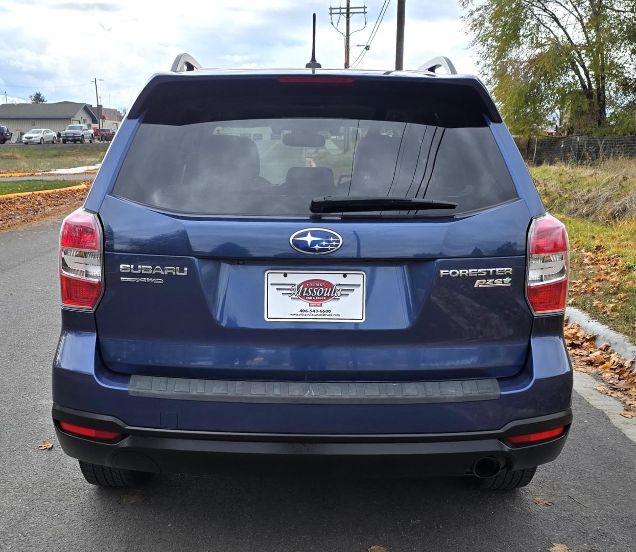 2014 Blue /White Subaru Forester 2.5i Touring (JF2SJAPC6EH) with an 2.5L H4 SOHC 16V engine, 6-Speed Automatic transmission, located at 450 N Russell, Missoula, MT, 59801, (406) 543-6600, 46.874496, -114.017433 - Super Clean One Owner AWD Forester. 2.5 H4 Engine. Automatic Transmission. Air. Cruise. Tilt. Power Sunroof. Navigation. Backup Camera. Bluetooth Audio and Phone. Heated Seats. Clean Title and Carfax. - Photo#5