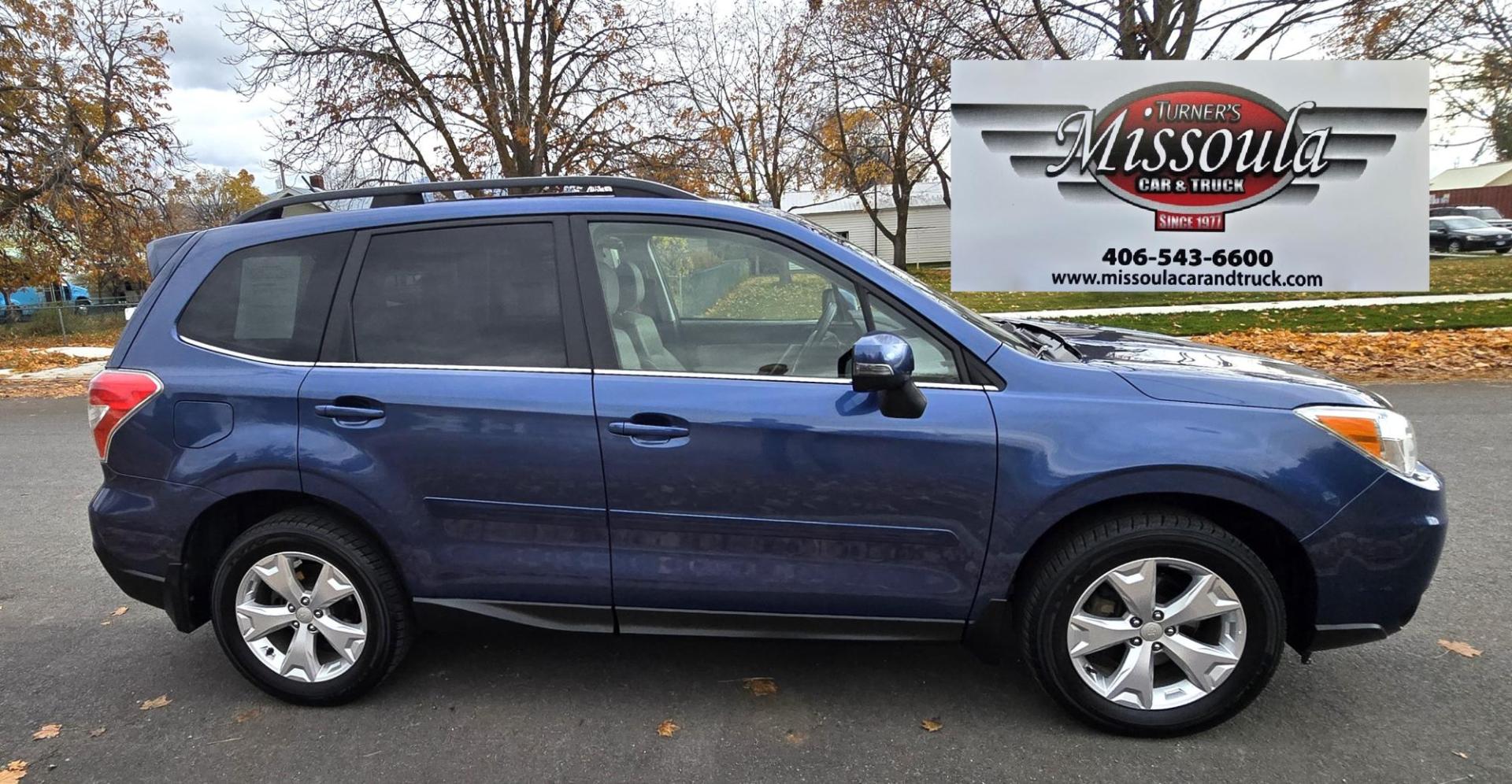 2014 Blue /White Subaru Forester 2.5i Touring (JF2SJAPC6EH) with an 2.5L H4 SOHC 16V engine, 6-Speed Automatic transmission, located at 450 N Russell, Missoula, MT, 59801, (406) 543-6600, 46.874496, -114.017433 - Super Clean One Owner AWD Forester. 2.5 H4 Engine. Automatic Transmission. Air. Cruise. Tilt. Power Sunroof. Navigation. Backup Camera. Bluetooth Audio and Phone. Heated Seats. Clean Title and Carfax. - Photo#6