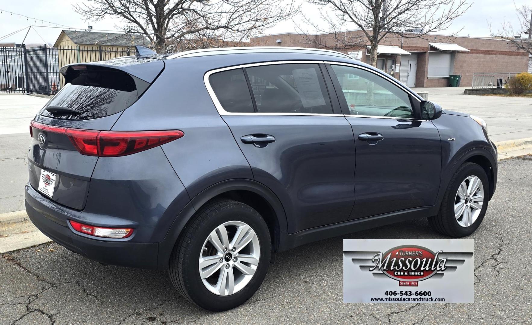 2017 Blue /White Kia Sportage LX AWD (KNDPMCACXH7) with an 2.4L V6 DOHC 24V engine, 6A transmission, located at 450 N Russell, Missoula, MT, 59801, (406) 543-6600, 46.874496, -114.017433 - Photo#1