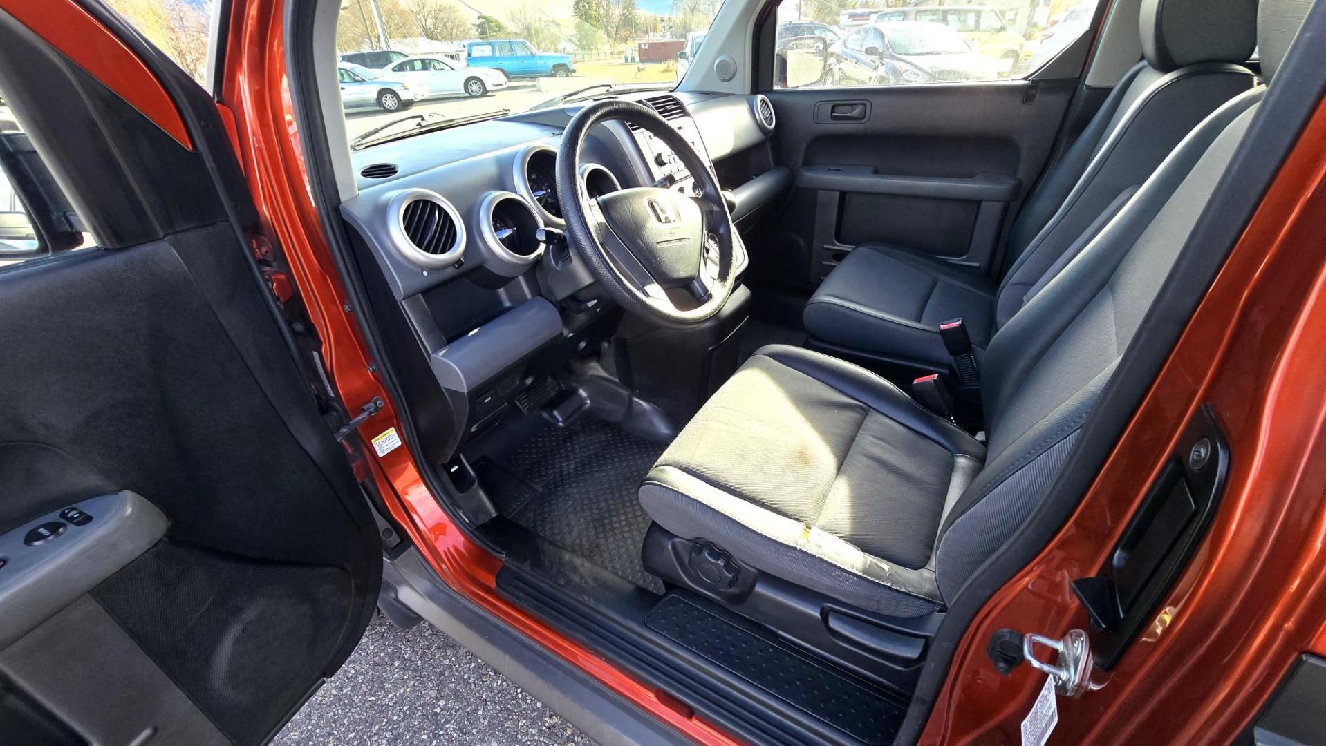 2005 Orange /Black Honda Element EX 4WD 4-spd AT (5J6YH28695L) with an 2.4L L4 DOHC 16V engine, 4-Speed Automatic Overdrive transmission, located at 450 N Russell, Missoula, MT, 59801, (406) 543-6600, 46.874496, -114.017433 - Photo#9