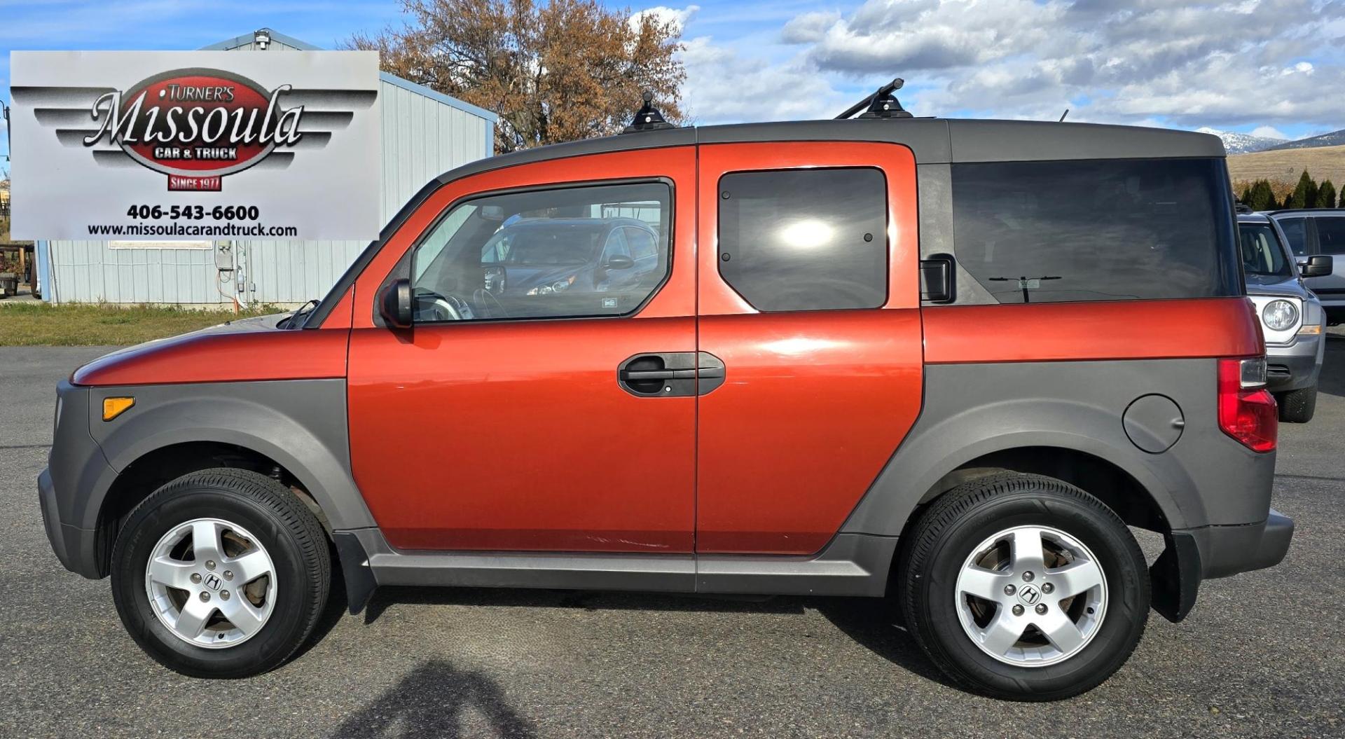 2005 Orange /Black Honda Element EX 4WD 4-spd AT (5J6YH28695L) with an 2.4L L4 DOHC 16V engine, 4-Speed Automatic Overdrive transmission, located at 450 N Russell, Missoula, MT, 59801, (406) 543-6600, 46.874496, -114.017433 - Photo#0