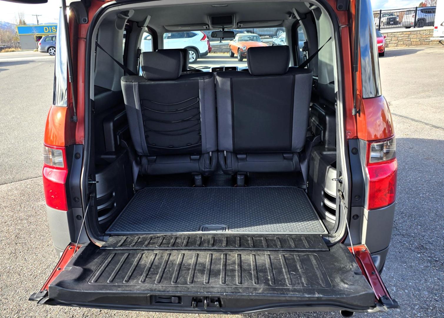 2005 Orange /Black Honda Element EX 4WD 4-spd AT (5J6YH28695L) with an 2.4L L4 DOHC 16V engine, 4-Speed Automatic Overdrive transmission, located at 450 N Russell, Missoula, MT, 59801, (406) 543-6600, 46.874496, -114.017433 - Photo#6