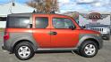 2005 Orange /Black Honda Element EX 4WD 4-spd AT (5J6YH28695L) with an 2.4L L4 DOHC 16V engine, 4-Speed Automatic Overdrive transmission, located at 450 N Russell, Missoula, MT, 59801, (406) 543-6600, 46.874496, -114.017433 - Photo#1