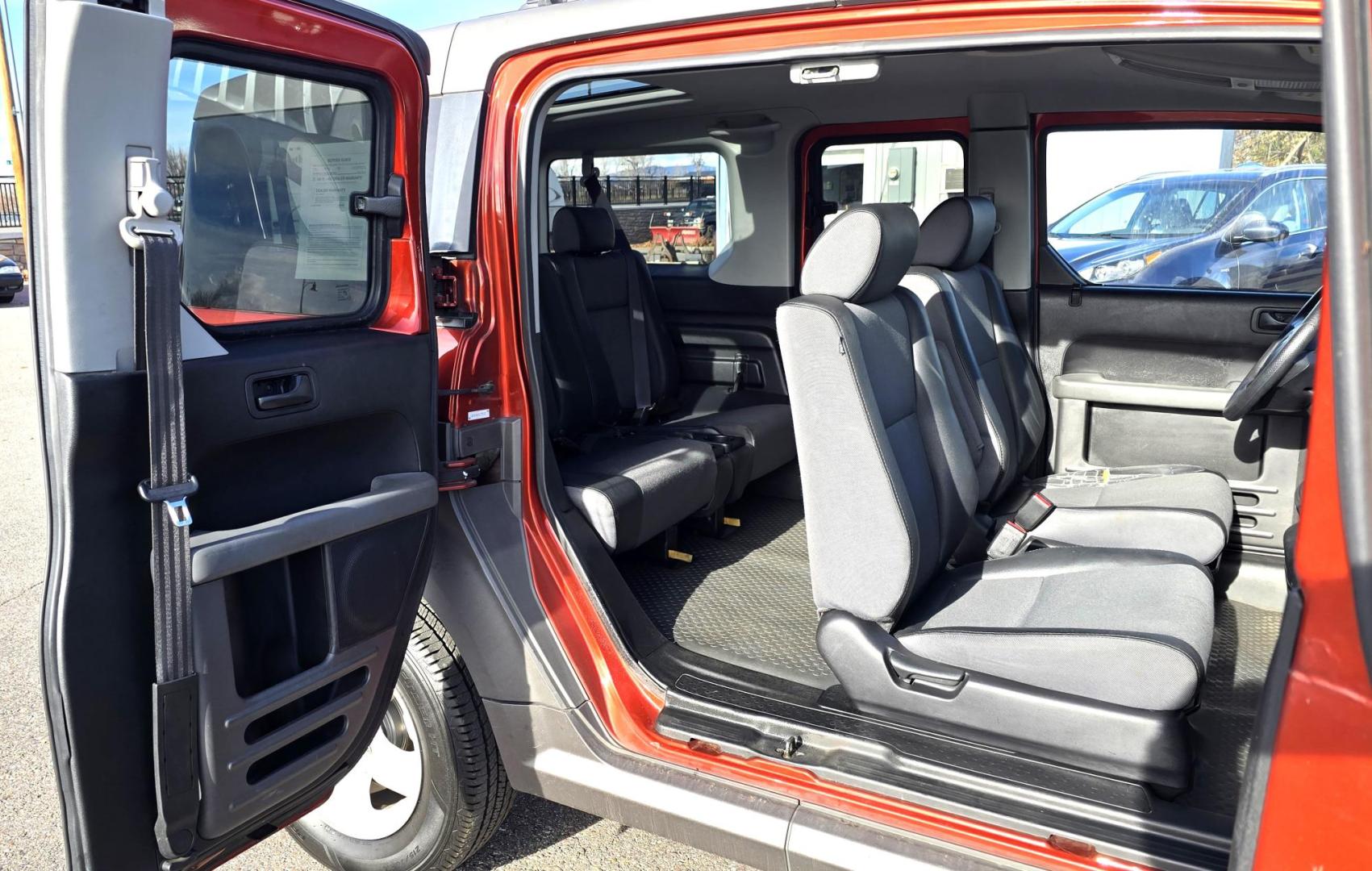 2005 Orange /Black Honda Element EX 4WD 4-spd AT (5J6YH28695L) with an 2.4L L4 DOHC 16V engine, 4-Speed Automatic Overdrive transmission, located at 450 N Russell, Missoula, MT, 59801, (406) 543-6600, 46.874496, -114.017433 - Photo#8