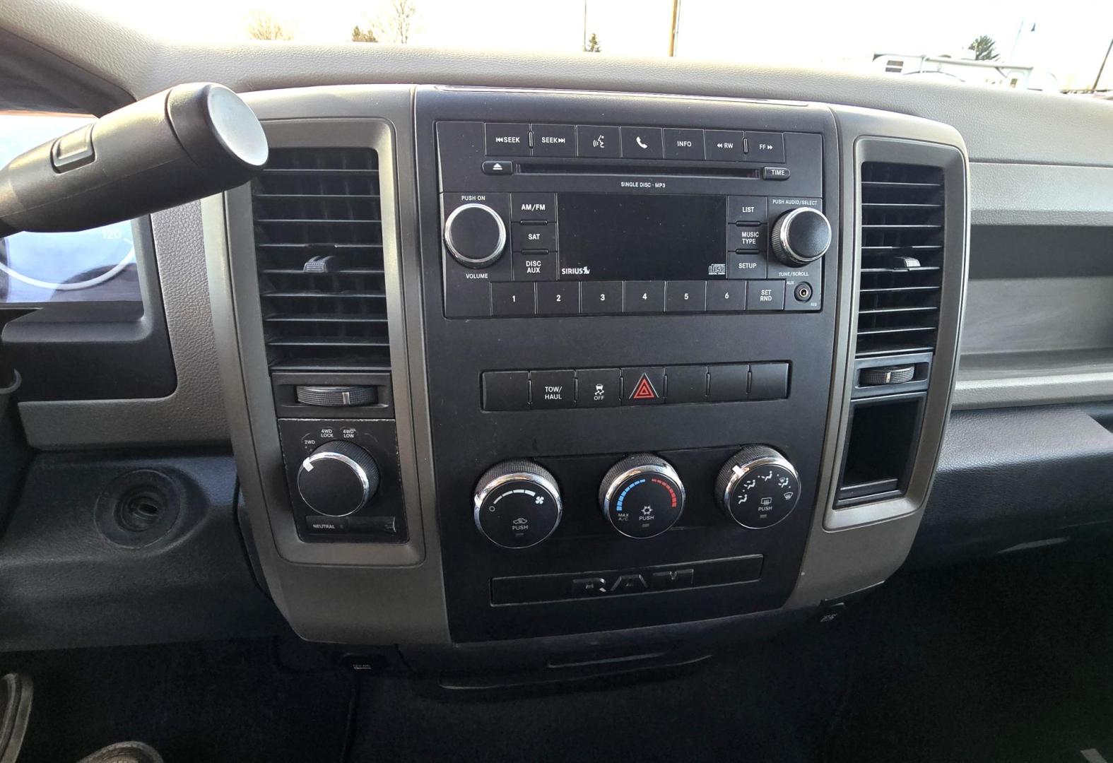 2010 Blue /Black Dodge Ram 1500 Laramie Quad Cab 4WD (1D7RV1GP2AS) with an 4.7L V8 SOHC 16V FFV engine, 5-Speed Automatic transmission, located at 450 N Russell, Missoula, MT, 59801, (406) 543-6600, 46.874496, -114.017433 - Photo#12