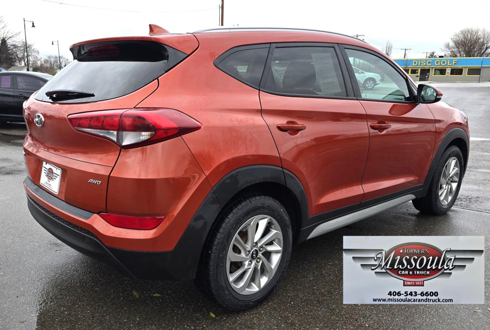 2017 Orange /Black Hyundai Tucson SE w/Preferred Package AWD (KM8J3CA44HU) with an 2.0L L4 DOHC 16V engine, 6A transmission, located at 450 N Russell, Missoula, MT, 59801, (406) 543-6600, 46.874496, -114.017433 - Beautiful Clean AWD SUV. 2.0L I4 Engine. 6 Speed Automatic Transmission. Heated Power Seats. Navigation. Infinity Sound System. AM FM SAT. Bluetooth Audio and Phone. Blindspot Detection. Backup Camera. - Photo#7