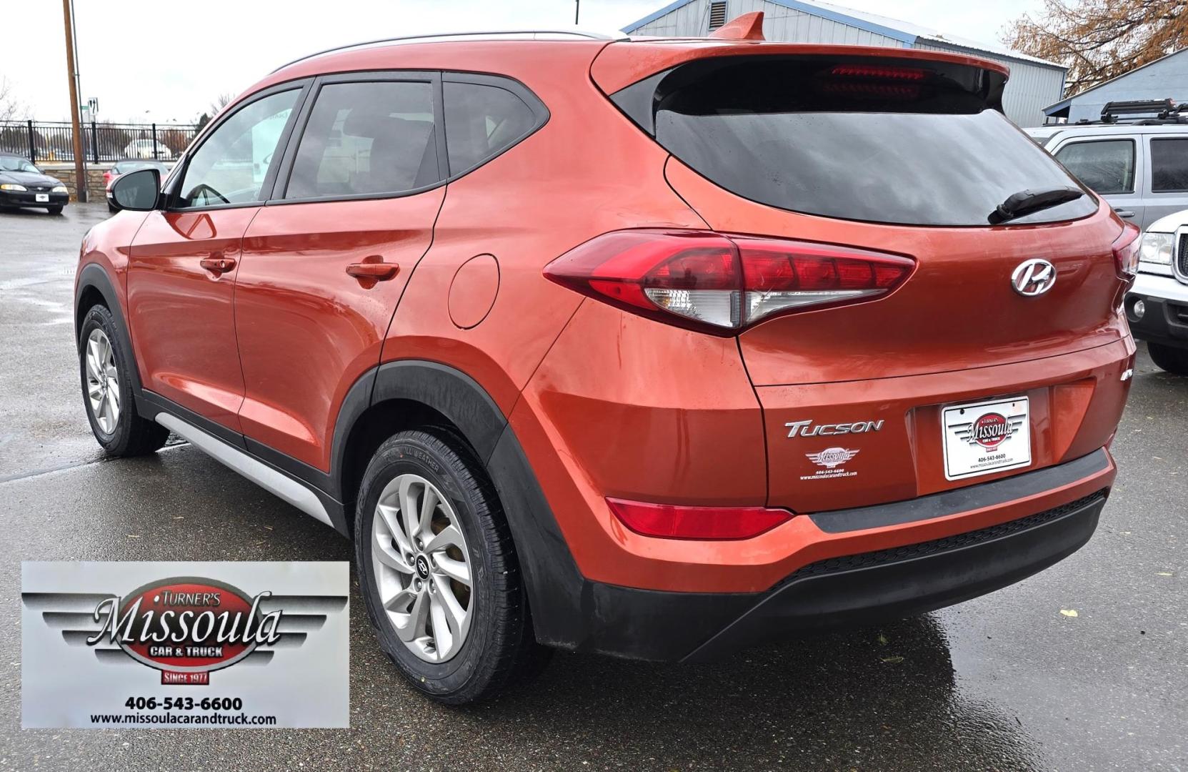 2017 Orange /Black Hyundai Tucson SE w/Preferred Package AWD (KM8J3CA44HU) with an 2.0L L4 DOHC 16V engine, 6A transmission, located at 450 N Russell, Missoula, MT, 59801, (406) 543-6600, 46.874496, -114.017433 - Beautiful Clean AWD SUV. 2.0L I4 Engine. 6 Speed Automatic Transmission. Heated Power Seats. Navigation. Infinity Sound System. AM FM SAT. Bluetooth Audio and Phone. Blindspot Detection. Backup Camera. - Photo#8