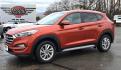 2017 Orange /Black Hyundai Tucson SE w/Preferred Package AWD (KM8J3CA44HU) with an 2.0L L4 DOHC 16V engine, 6A transmission, located at 450 N Russell, Missoula, MT, 59801, (406) 543-6600, 46.874496, -114.017433 - Beautiful Clean AWD SUV. 2.0L I4 Engine. 6 Speed Automatic Transmission. Heated Power Seats. Navigation. Infinity Sound System. AM FM SAT. Bluetooth Audio and Phone. Blindspot Detection. Backup Camera. - Photo#0