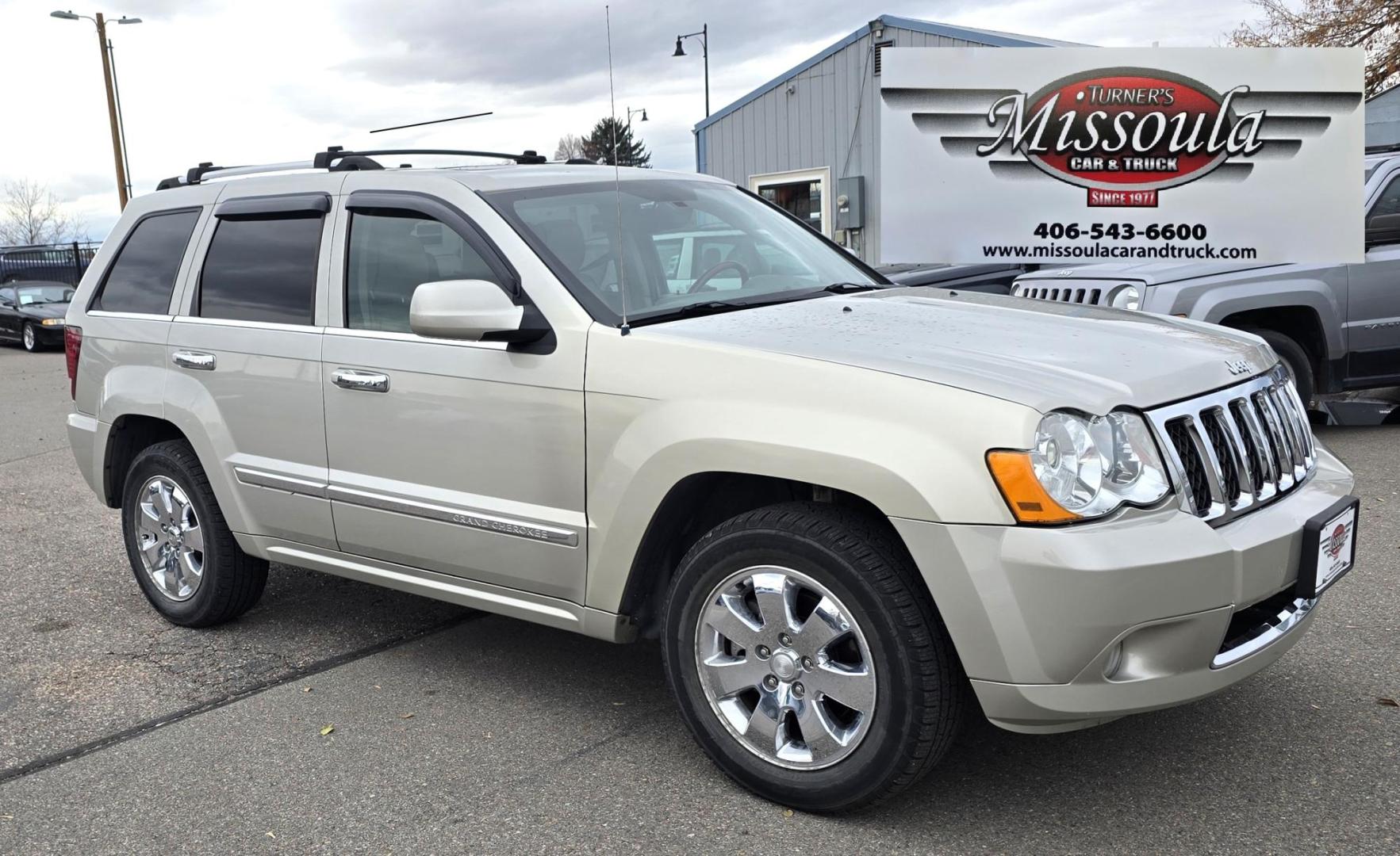 2009 Silver /White Jeep Grand Cherokee Overland 4WD (1J8HR68T49C) with an 5.7L V8 OHV 16V engine, 5-Speed Automatic transmission, located at 450 N Russell, Missoula, MT, 59801, (406) 543-6600, 46.874496, -114.017433 - Incredibly Nice Jeep Grand Cherokee Overland Edition 4WD SUV. 5.7 Hemi Engine. Leather Heated Front and Rear Seats. Power Seats. Navigation. Bluetooth. AM FM CD SAT. Power Sunroof. Power Windows and Locks. Remote Start. Towing. - Photo#0