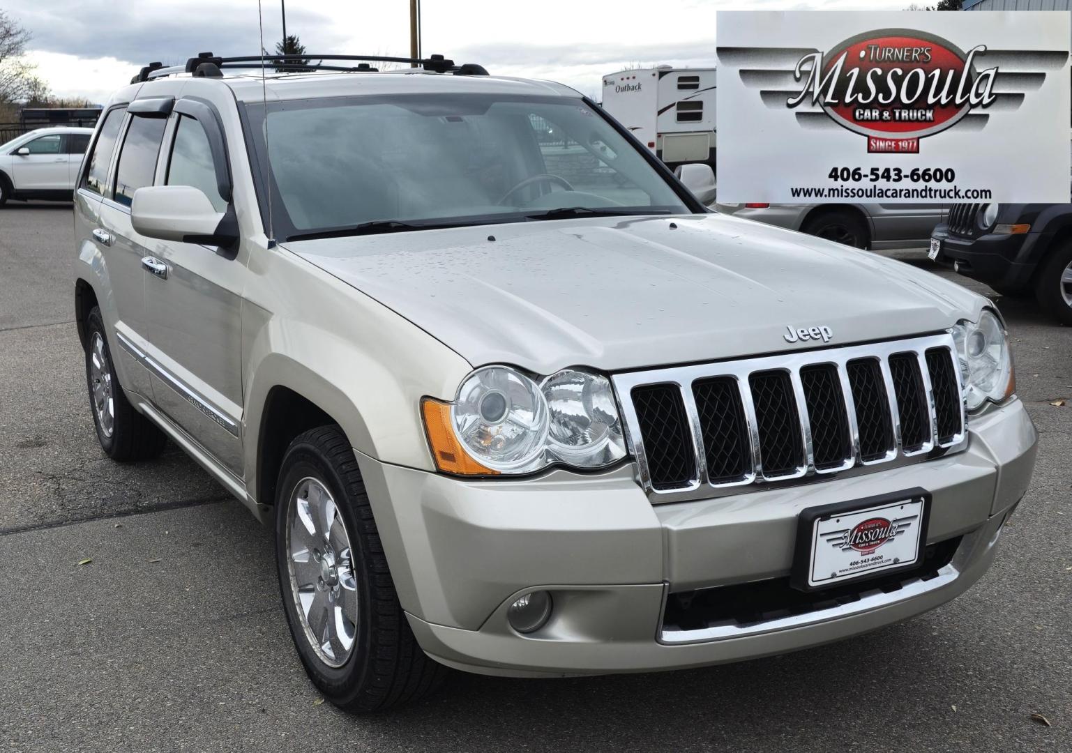 2009 Silver /White Jeep Grand Cherokee Overland 4WD (1J8HR68T49C) with an 5.7L V8 OHV 16V engine, 5-Speed Automatic transmission, located at 450 N Russell, Missoula, MT, 59801, (406) 543-6600, 46.874496, -114.017433 - Incredibly Nice Jeep Grand Cherokee Overland Edition 4WD SUV. 5.7 Hemi Engine. Leather Heated Front and Rear Seats. Power Seats. Navigation. Bluetooth. AM FM CD SAT. Power Sunroof. Power Windows and Locks. Remote Start. Towing. - Photo#8