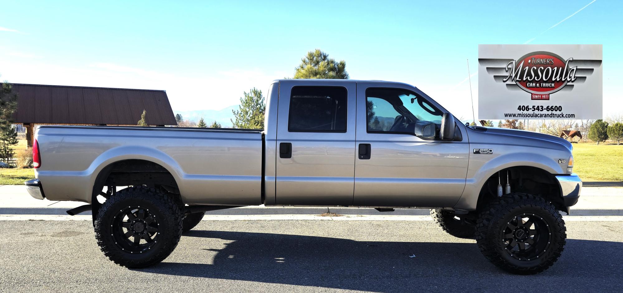 photo of 2004 Ford F-250 SD XLT Crew Cab 4WD LIFTED!