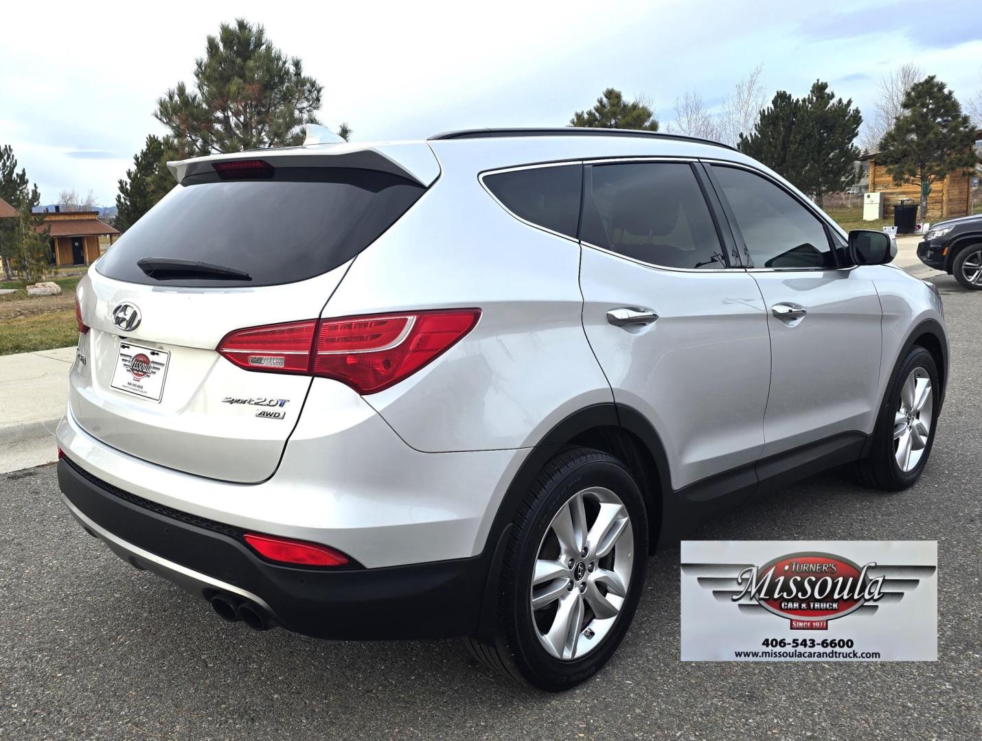 2014 Silver /Black Hyundai Santa Fe Sport 2.0T AWD (5XYZWDLA1EG) with an 2.0L L4 DOHC 16V TURBO engine, 6-Speed Automatic transmission, located at 450 N Russell, Missoula, MT, 59801, (406) 543-6600, 46.874496, -114.017433 - Really nice Santa Fe AWD. 2.0L I4 Engine. automatic Transmission. Huge Sunroof. Navigation. Bluetooth Audio and Phone. Backup Camera. Air Cruise Tilt. heated and Cooled seats. - Photo#1