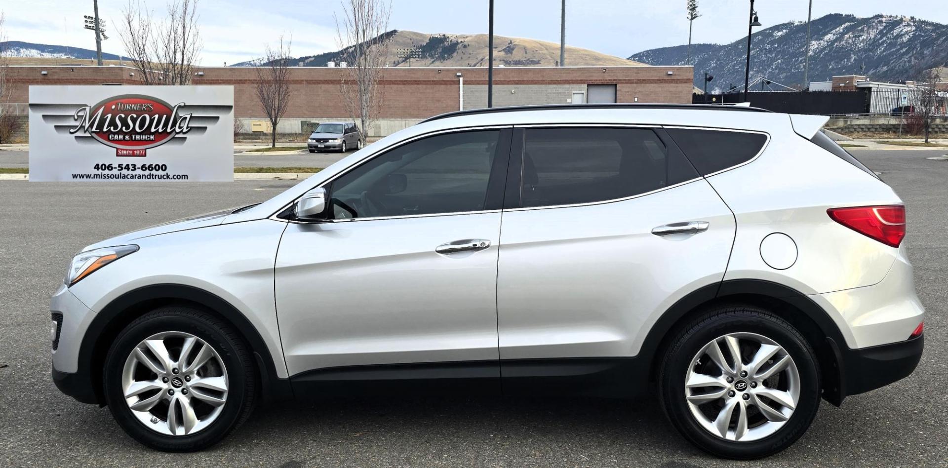 2014 Silver /Black Hyundai Santa Fe Sport 2.0T AWD (5XYZWDLA1EG) with an 2.0L L4 DOHC 16V TURBO engine, 6-Speed Automatic transmission, located at 450 N Russell, Missoula, MT, 59801, (406) 543-6600, 46.874496, -114.017433 - Really nice Santa Fe AWD. 2.0L I4 Engine. automatic Transmission. Huge Sunroof. Navigation. Bluetooth Audio and Phone. Backup Camera. Air Cruise Tilt. heated and Cooled seats. - Photo#6