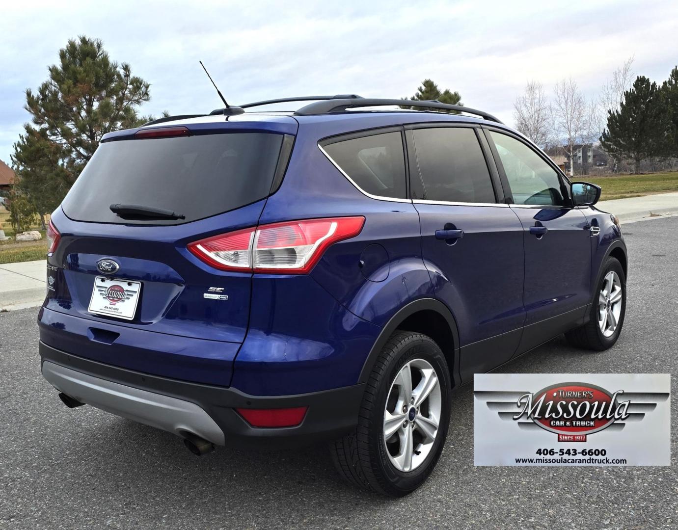 2014 Blue /Gray Ford Escape SE 4WD (1FMCU9GXXEU) with an 1.6L L4 DOHC 16V engine, 6-Speed Automatic transmission, located at 450 N Russell, Missoula, MT, 59801, (406) 543-6600, 46.874496, -114.017433 - One Owner 4WD with a Clean Carfax. 1.6L I4 Engine. Air. Cruise. Tilt. Bluetooth Audio and Phone. Sync Voice System. AM FM CD Sirius. - Photo#1