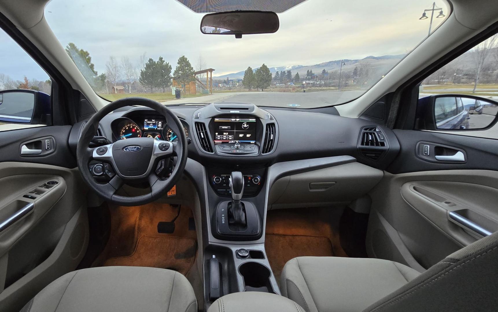 2014 Blue /Gray Ford Escape SE 4WD (1FMCU9GXXEU) with an 1.6L L4 DOHC 16V engine, 6-Speed Automatic transmission, located at 450 N Russell, Missoula, MT, 59801, (406) 543-6600, 46.874496, -114.017433 - One Owner 4WD with a Clean Carfax. 1.6L I4 Engine. Air. Cruise. Tilt. Bluetooth Audio and Phone. Sync Voice System. AM FM CD Sirius. - Photo#13