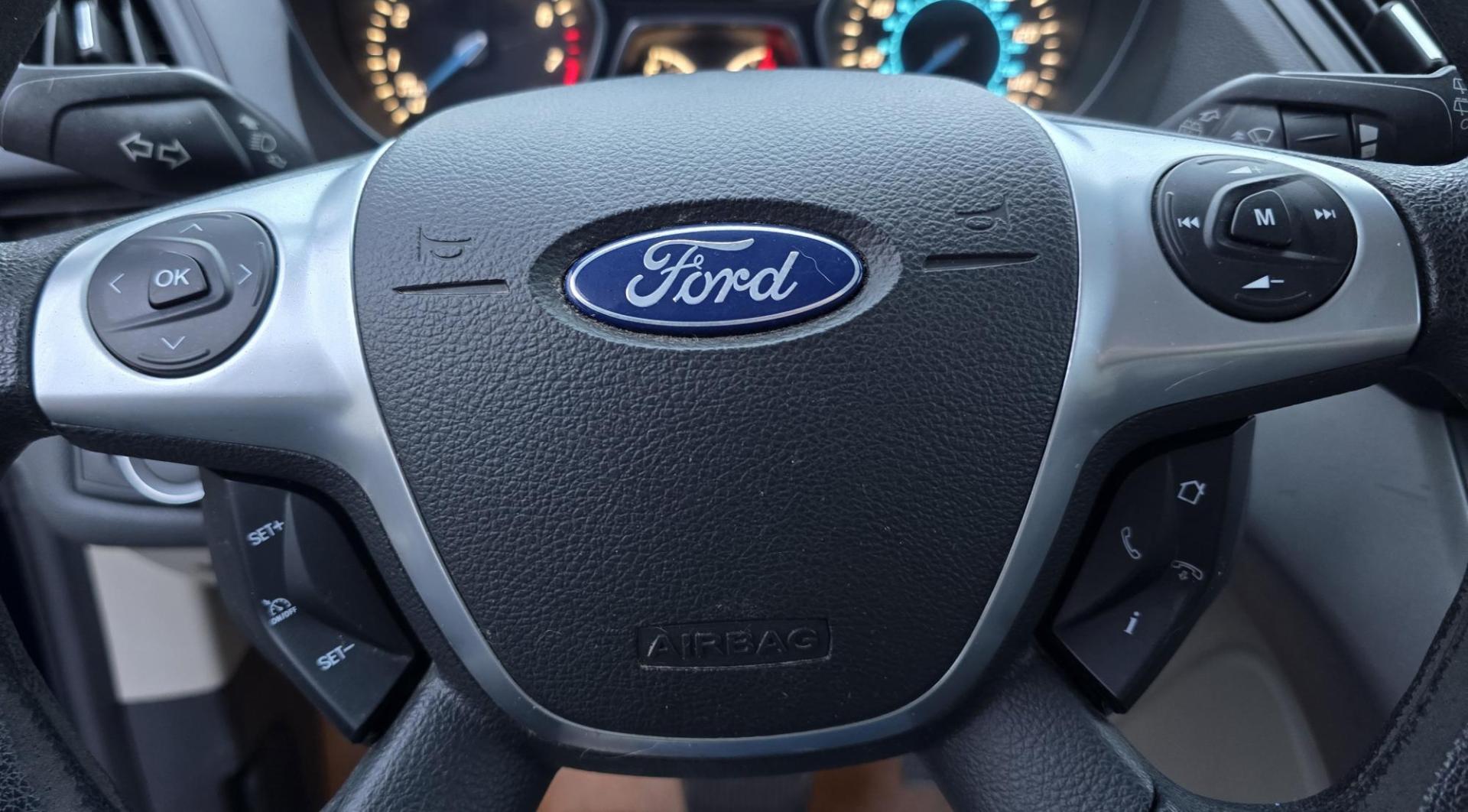 2014 Blue /Gray Ford Escape SE 4WD (1FMCU9GXXEU) with an 1.6L L4 DOHC 16V engine, 6-Speed Automatic transmission, located at 450 N Russell, Missoula, MT, 59801, (406) 543-6600, 46.874496, -114.017433 - One Owner 4WD with a Clean Carfax. 1.6L I4 Engine. Air. Cruise. Tilt. Bluetooth Audio and Phone. Sync Voice System. AM FM CD Sirius. - Photo#19