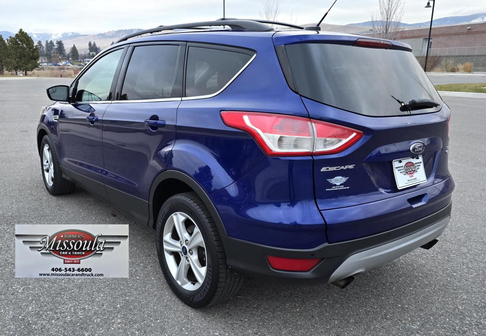 2014 Blue /Gray Ford Escape SE 4WD (1FMCU9GXXEU) with an 1.6L L4 DOHC 16V engine, 6-Speed Automatic transmission, located at 450 N Russell, Missoula, MT, 59801, (406) 543-6600, 46.874496, -114.017433 - One Owner 4WD with a Clean Carfax. 1.6L I4 Engine. Air. Cruise. Tilt. Bluetooth Audio and Phone. Sync Voice System. AM FM CD Sirius. - Photo#3