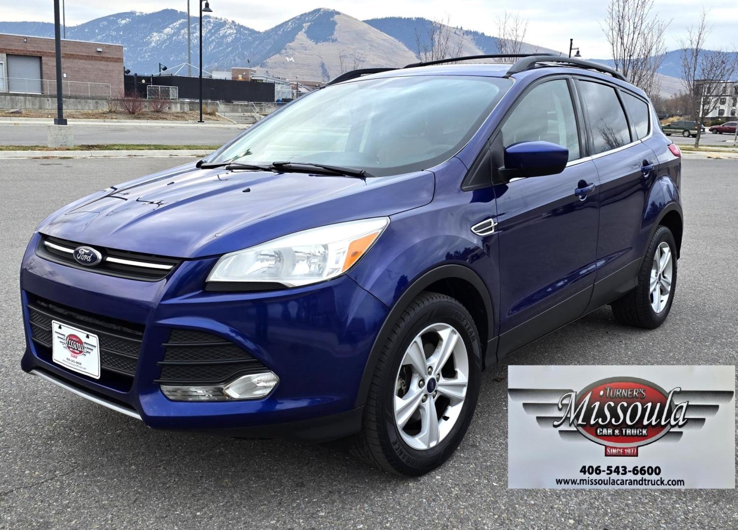 2014 Blue /Gray Ford Escape SE 4WD (1FMCU9GXXEU) with an 1.6L L4 DOHC 16V engine, 6-Speed Automatic transmission, located at 450 N Russell, Missoula, MT, 59801, (406) 543-6600, 46.874496, -114.017433 - One Owner 4WD with a Clean Carfax. 1.6L I4 Engine. Air. Cruise. Tilt. Bluetooth Audio and Phone. Sync Voice System. AM FM CD Sirius. - Photo#2