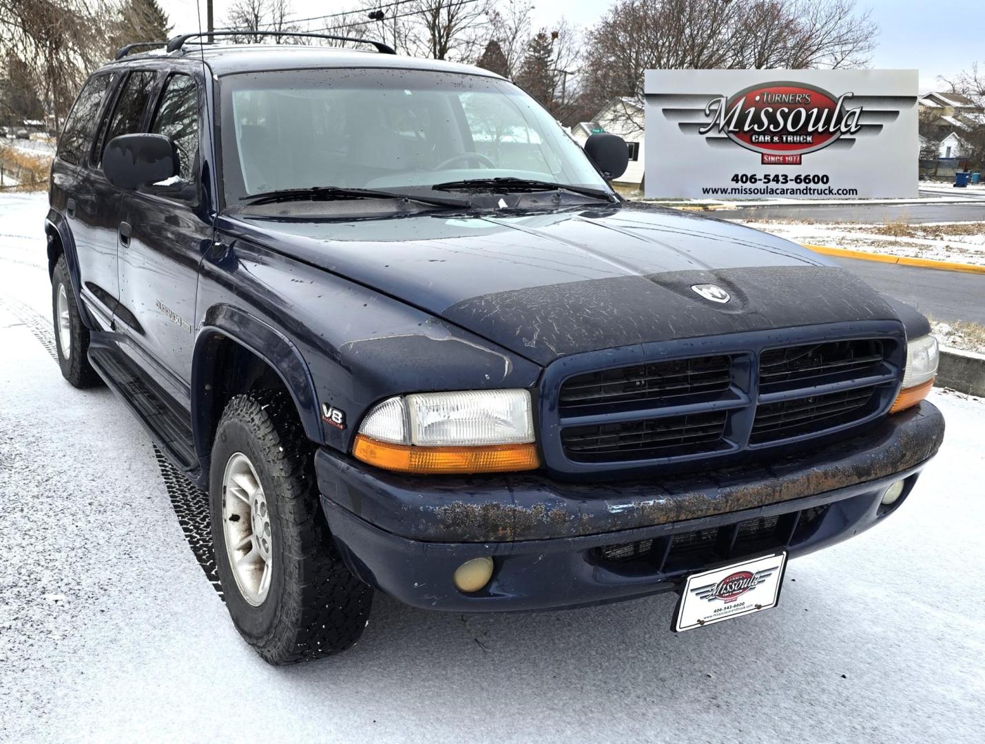 2000 Blue /Gray Dodge Durango 4WD (1B4HS28Z3YF) with an 5.9L V8 OHV 16V engine, 4-Speed Automatic Overdrive transmission, located at 450 N Russell, Missoula, MT, 59801, (406) 543-6600, 46.874496, -114.017433 - Great Running 4WD SUV. 5.9L V8 Engine. Automatic. 3rd Row Seating. Air. Cruise. Tilt. Power Windows and Locks. Towing. Does have a check engine light on that says Cam Position Sensor. Passenger Rear Windows doesn't work. Drivers seat has a couple tears. Front Bumper needs painted. Not a perfect vehi - Photo#2