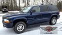 2000 Blue /Gray Dodge Durango 4WD (1B4HS28Z3YF) with an 5.9L V8 OHV 16V engine, 4-Speed Automatic Overdrive transmission, located at 450 N Russell, Missoula, MT, 59801, (406) 543-6600, 46.874496, -114.017433 - Great Running 4WD SUV. 5.9L V8 Engine. Automatic. 3rd Row Seating. Air. Cruise. Tilt. Power Windows and Locks. Towing. Does have a check engine light on that says Cam Position Sensor. Passenger Rear Windows doesn't work. Drivers seat has a couple tears. Front Bumper needs painted. Not a perfect vehi - Photo#4