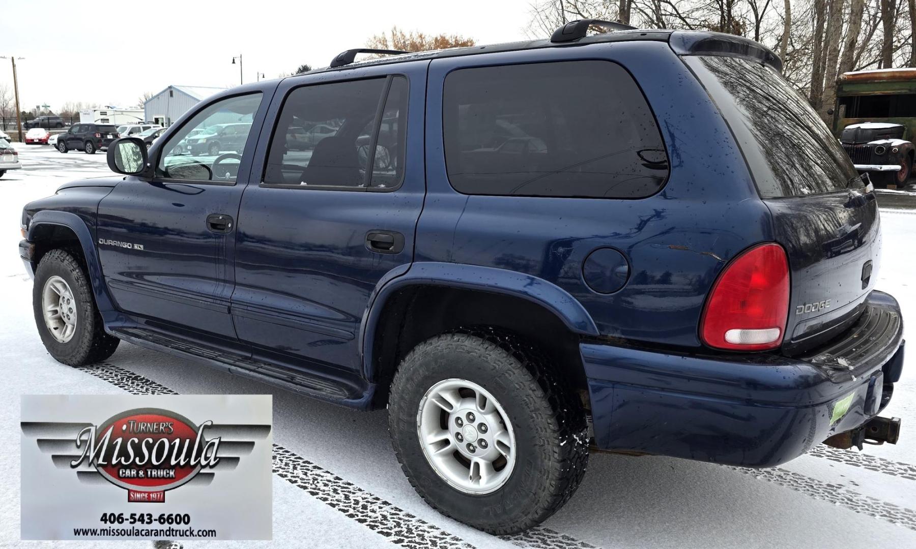 2000 Blue /Gray Dodge Durango 4WD (1B4HS28Z3YF) with an 5.9L V8 OHV 16V engine, 4-Speed Automatic Overdrive transmission, located at 450 N Russell, Missoula, MT, 59801, (406) 543-6600, 46.874496, -114.017433 - Great Running 4WD SUV. 5.9L V8 Engine. Automatic. 3rd Row Seating. Air. Cruise. Tilt. Power Windows and Locks. Towing. Does have a check engine light on that says Cam Position Sensor. Passenger Rear Windows doesn't work. Drivers seat has a couple tears. Front Bumper needs painted. Not a perfect vehi - Photo#5