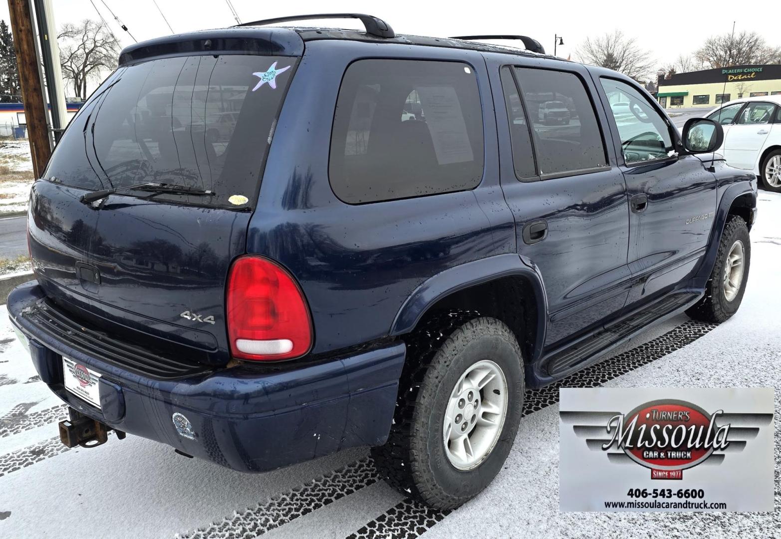 2000 Blue /Gray Dodge Durango 4WD (1B4HS28Z3YF) with an 5.9L V8 OHV 16V engine, 4-Speed Automatic Overdrive transmission, located at 450 N Russell, Missoula, MT, 59801, (406) 543-6600, 46.874496, -114.017433 - Great Running 4WD SUV. 5.9L V8 Engine. Automatic. 3rd Row Seating. Air. Cruise. Tilt. Power Windows and Locks. Towing. Does have a check engine light on that says Cam Position Sensor. Passenger Rear Windows doesn't work. Drivers seat has a couple tears. Front Bumper needs painted. Not a perfect vehi - Photo#8