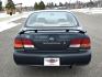 1998 Green /Tan Nissan Maxima SE (JN1CA21A1WT) with an 3.0L V6 DOHC 24V engine, 4-Speed Automatic Overdrive transmission, located at 450 N Russell, Missoula, MT, 59801, (406) 543-6600, 46.874496, -114.017433 - Very Nice Maxima in excellent condition. 3.0L V6 Engine. Automatic Transmission. Power Sunroof. Air. Cruise. Tilt. Power Windows and Locks. Aftermarket Touch Screen Cd Player with Bluetooth audio and phone. American Racer Wheels with Newer Tires. Extra SEt of Wheels with Studded Snow Tires. 3 Owner - Photo#9