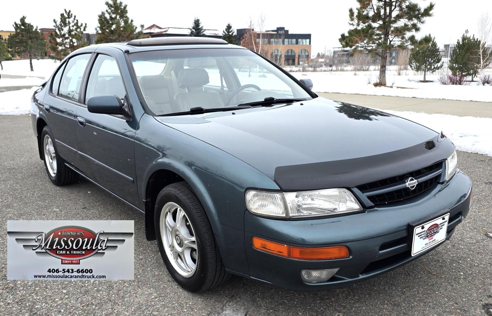 1998 Green /Tan Nissan Maxima SE (JN1CA21A1WT) with an 3.0L V6 DOHC 24V engine, 4-Speed Automatic Overdrive transmission, located at 450 N Russell, Missoula, MT, 59801, (406) 543-6600, 46.874496, -114.017433 - Very Nice Maxima in excellent condition. 3.0L V6 Engine. Automatic Transmission. Power Sunroof. Air. Cruise. Tilt. Power Windows and Locks. Aftermarket Touch Screen Cd Player with Bluetooth audio and phone. American Racer Wheels with Newer Tires. Extra SEt of Wheels with Studded Snow Tires. 3 Owner - Photo#8