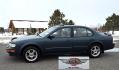 1998 Green /Tan Nissan Maxima SE (JN1CA21A1WT) with an 3.0L V6 DOHC 24V engine, 4-Speed Automatic Overdrive transmission, located at 450 N Russell, Missoula, MT, 59801, (406) 543-6600, 46.874496, -114.017433 - Very Nice Maxima in excellent condition. 3.0L V6 Engine. Automatic Transmission. Power Sunroof. Air. Cruise. Tilt. Power Windows and Locks. Aftermarket Touch Screen Cd Player with Bluetooth audio and phone. American Racer Wheels with Newer Tires. Extra SEt of Wheels with Studded Snow Tires. 3 Owner - Photo#4