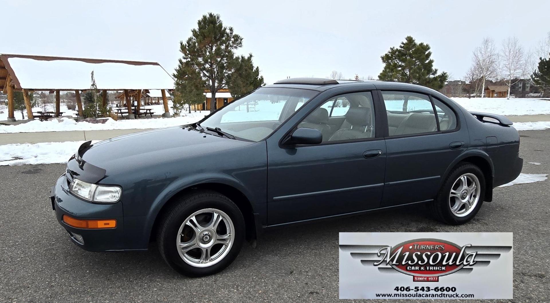 1998 Green /Tan Nissan Maxima SE (JN1CA21A1WT) with an 3.0L V6 DOHC 24V engine, 4-Speed Automatic Overdrive transmission, located at 450 N Russell, Missoula, MT, 59801, (406) 543-6600, 46.874496, -114.017433 - Very Nice Maxima in excellent condition. 3.0L V6 Engine. Automatic Transmission. Power Sunroof. Air. Cruise. Tilt. Power Windows and Locks. Aftermarket Touch Screen Cd Player with Bluetooth audio and phone. American Racer Wheels with Newer Tires. Extra SEt of Wheels with Studded Snow Tires. 3 Owner - Photo#3