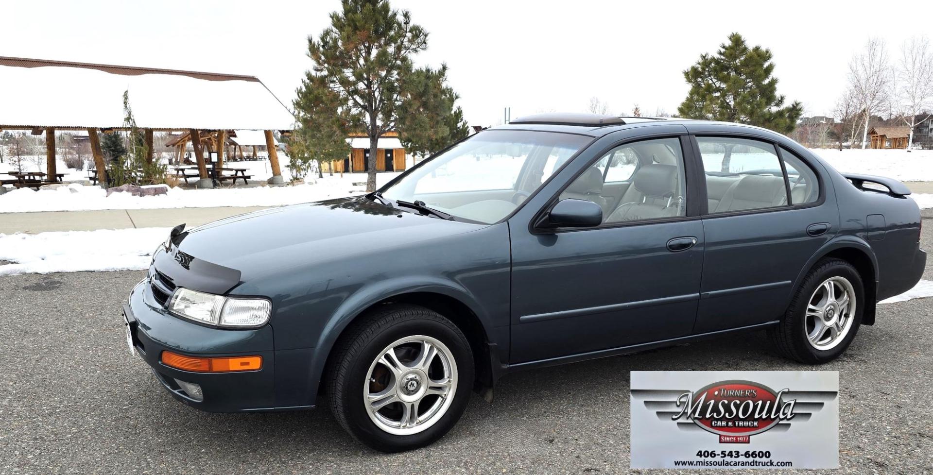 1998 Green /Tan Nissan Maxima SE (JN1CA21A1WT) with an 3.0L V6 DOHC 24V engine, 4-Speed Automatic Overdrive transmission, located at 450 N Russell, Missoula, MT, 59801, (406) 543-6600, 46.874496, -114.017433 - Very Nice Maxima in excellent condition. 3.0L V6 Engine. Automatic Transmission. Power Sunroof. Air. Cruise. Tilt. Power Windows and Locks. Aftermarket Touch Screen Cd Player with Bluetooth audio and phone. American Racer Wheels with Newer Tires. Extra SEt of Wheels with Studded Snow Tires. 3 Owner - Photo#0