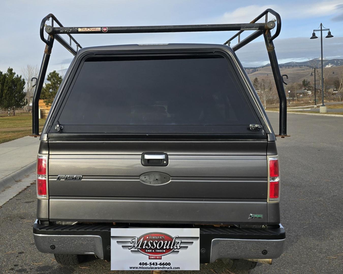 2010 Grey /Gray Ford F-150 XLT SuperCrew 5.5-ft. Bed 4WD (1FTFW1EV4AF) with an 5.4L V8 SOHC 24V FFV engine, 4-Speed Automatic transmission, located at 450 N Russell, Missoula, MT, 59801, (406) 543-6600, 46.874496, -114.017433 - Great Running F150 XLT 4WD. 5.4L V8. 6 Speed Automatic Transmission. 2 Owner with Clean Carfax. Power Drivers Seat. Air. Cruise. Tilt. Adjustable Pedals. Power Windows and Locks. AM FM XM CD. Bluetooth Audio and Phone. Running Boards. Topper and Timber Rack. - Photo#3