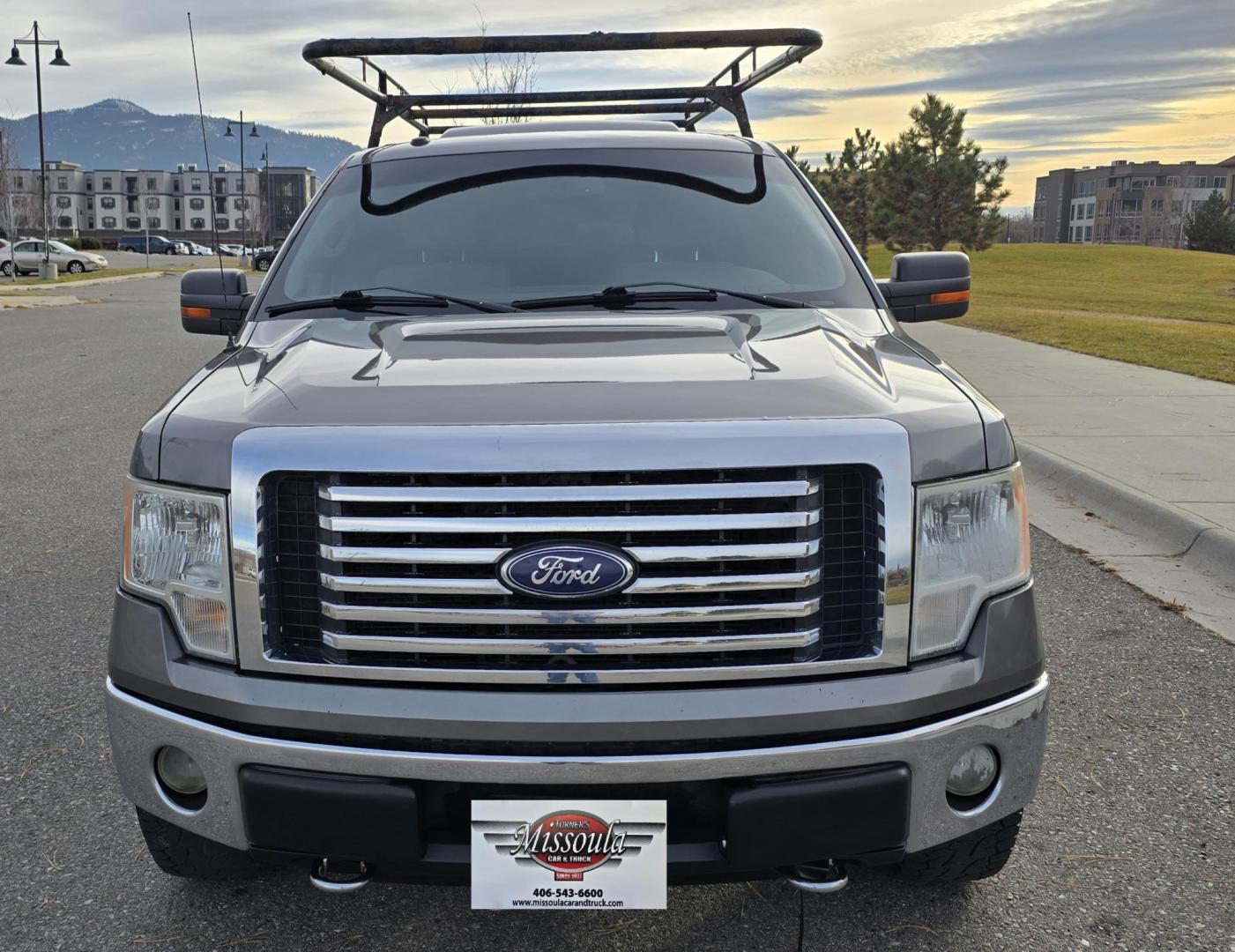 2010 Grey /Gray Ford F-150 XLT SuperCrew 5.5-ft. Bed 4WD (1FTFW1EV4AF) with an 5.4L V8 SOHC 24V FFV engine, 4-Speed Automatic transmission, located at 450 N Russell, Missoula, MT, 59801, (406) 543-6600, 46.874496, -114.017433 - Great Running F150 XLT 4WD. 5.4L V8. 6 Speed Automatic Transmission. 2 Owner with Clean Carfax. Power Drivers Seat. Air. Cruise. Tilt. Adjustable Pedals. Power Windows and Locks. AM FM XM CD. Bluetooth Audio and Phone. Running Boards. Topper and Timber Rack. - Photo#8