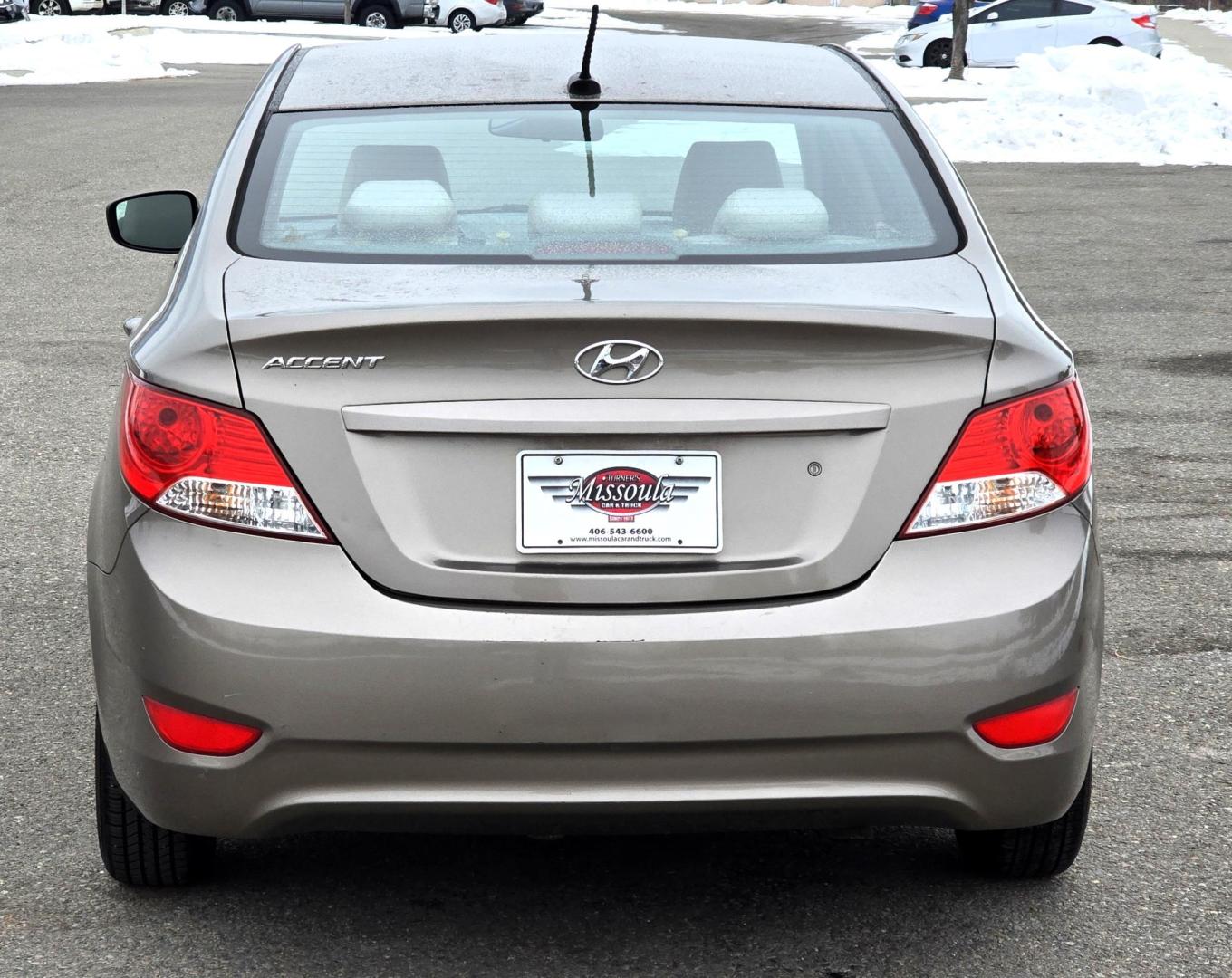 2013 Gold /Tan Hyundai Accent GLS 4-Door (KMHCT4AE2DU) with an 1.6L L4 DOHC 16V engine, Automatic transmission, located at 450 N Russell, Missoula, MT, 59801, (406) 543-6600, 46.874496, -114.017433 - Excellent Fuel economy Car. Runs Great. Only 88K Miles. 1.6L I4 Engine. Front Wheel Drive. Air Conditioning. AM FM XM CD Player. Tilt Steering. Power Windows and Locks. Keyless Entry. - Photo#5