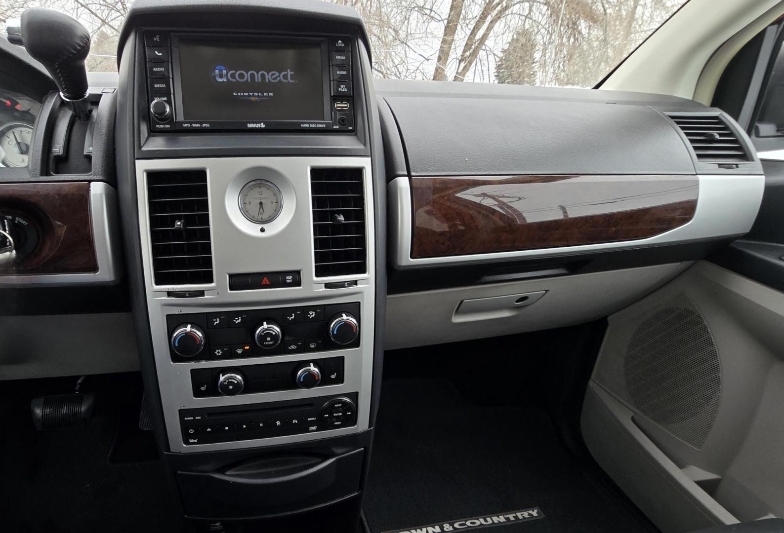 2010 Red /White Chrysler Town & Country Touring Plus (2A4RR8DX4AR) with an 4.0L V6 SOHC 24V engine, 6-Speed Automatic transmission, located at 450 N Russell, Missoula, MT, 59801, (406) 543-6600, 46.874496, -114.017433 - Very Clean Town and Country. 4.0L v6 Engine. Automatic Transmission. Front Wheel Drive. Heated Front Seats. Dual Climate Control. Front and Rear Entertainment. AM FM XM Bluetooth. 3rd Row Seating. Power Rear Doors. Remote start. Excellent Tires. One small dent. Has a "ESP BAS" Light on. Runs Amazing - Photo#16