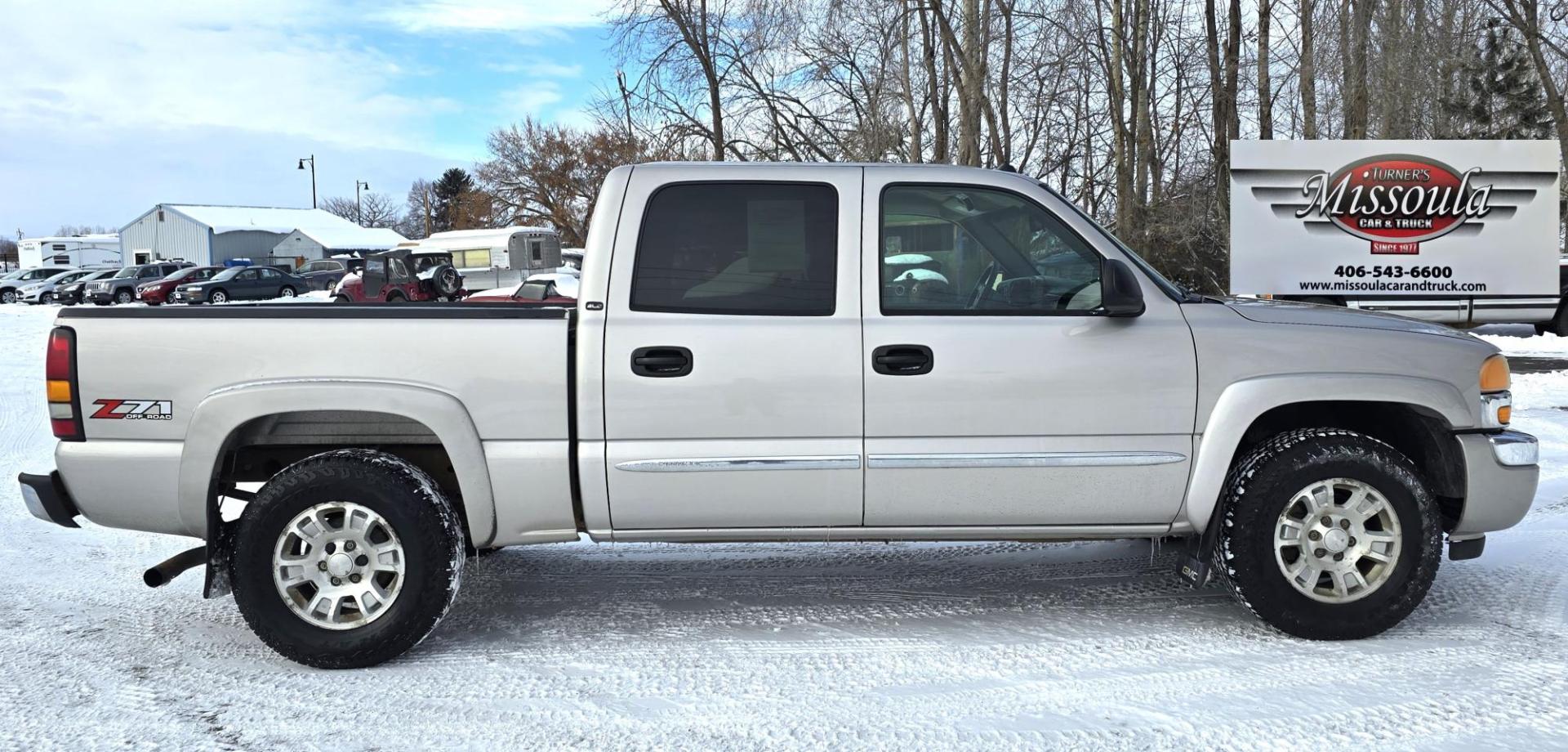 2005 Silver /Gray GMC Sierra 1500 SLE Crew Cab Short Bed 4WD (2GTEK13T151) with an 5.3L V8 OHV 16V engine, 4-Speed Automatic Overdrive transmission, located at 450 N Russell, Missoula, MT, 59801, (406) 543-6600, 46.874496, -114.017433 - Photo#4