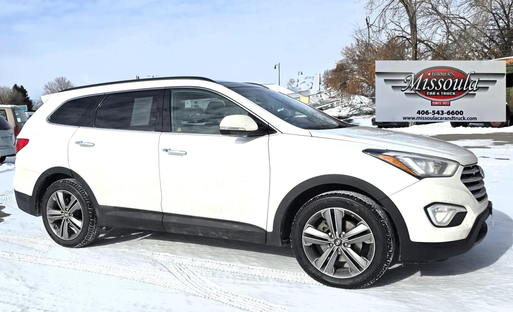 2013 White /Brown Hyundai Santa Fe Limited AWD (KM8SRDHF2DU) with an 3.3L V6 DOHC 24V engine, 6-Speed Automatic transmission, located at 450 N Russell, Missoula, MT, 59801, (406) 543-6600, 46.874496, -114.017433 - Nice One Owner AWD SUV. Clean Carfax. 3.3L V6 Engine. All Wheel Drive. Beautiful Brown Leather Interior. Heated Power Seats. Panoramic Sunroof. Heated Middle Seats. 3rd Row Seating. Infinity Sound System. AM FM XM CD Player. Navigation. Backup Camera. Heated Steering Wheel. Bluetooth Phone and Audio - Photo#2