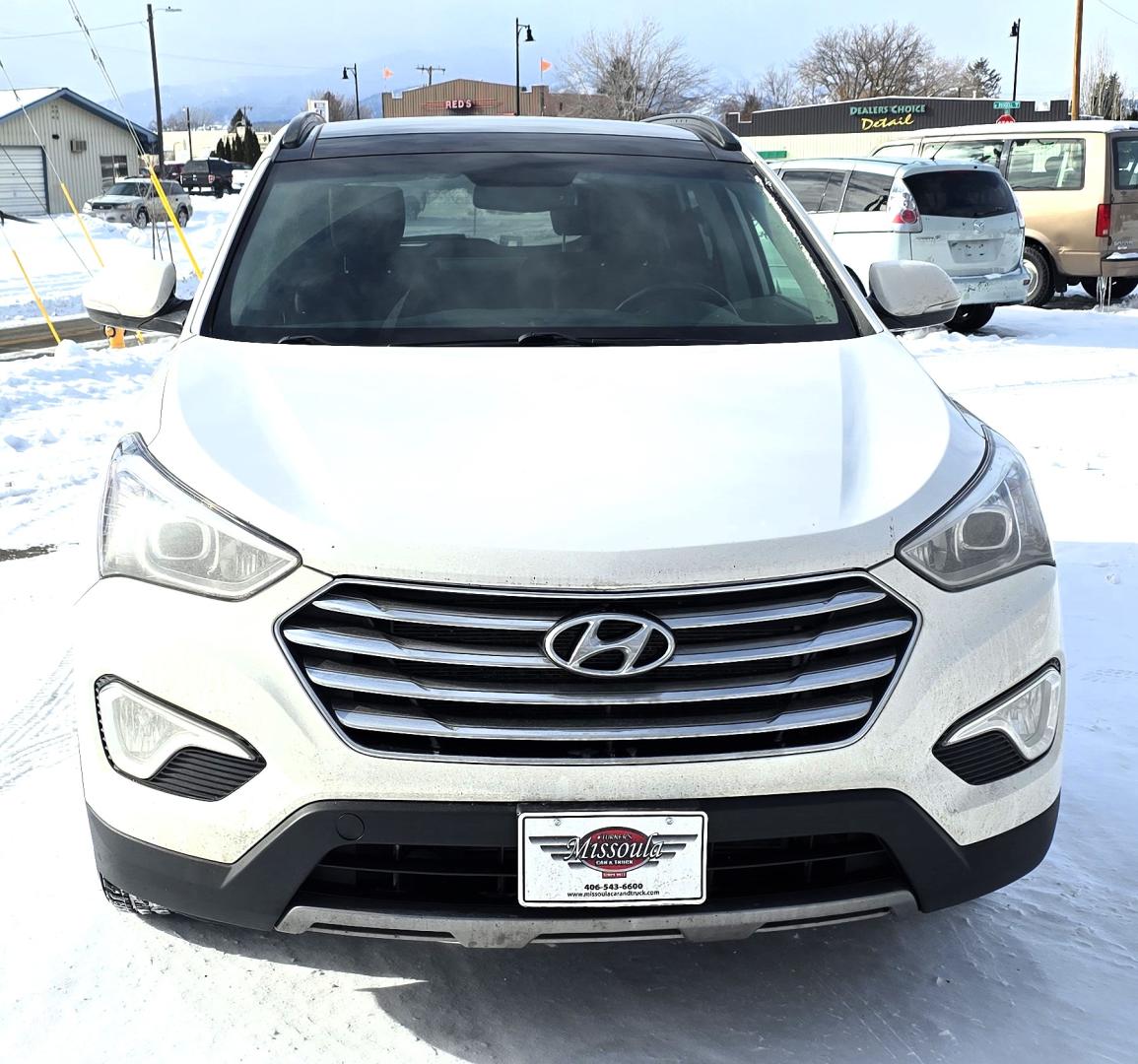 2013 White /Brown Hyundai Santa Fe Limited AWD (KM8SRDHF2DU) with an 3.3L V6 DOHC 24V engine, 6-Speed Automatic transmission, located at 450 N Russell, Missoula, MT, 59801, (406) 543-6600, 46.874496, -114.017433 - Nice One Owner AWD SUV. Clean Carfax. 3.3L V6 Engine. All Wheel Drive. Beautiful Brown Leather Interior. Heated Power Seats. Panoramic Sunroof. Heated Middle Seats. 3rd Row Seating. Infinity Sound System. AM FM XM CD Player. Navigation. Backup Camera. Heated Steering Wheel. Bluetooth Phone and Audio - Photo#5