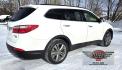 2013 White /Brown Hyundai Santa Fe Limited AWD (KM8SRDHF2DU) with an 3.3L V6 DOHC 24V engine, 6-Speed Automatic transmission, located at 450 N Russell, Missoula, MT, 59801, (406) 543-6600, 46.874496, -114.017433 - Nice One Owner AWD SUV. Clean Carfax. 3.3L V6 Engine. All Wheel Drive. Beautiful Brown Leather Interior. Heated Power Seats. Panoramic Sunroof. Heated Middle Seats. 3rd Row Seating. Infinity Sound System. AM FM XM CD Player. Navigation. Backup Camera. Heated Steering Wheel. Bluetooth Phone and Audio - Photo#4