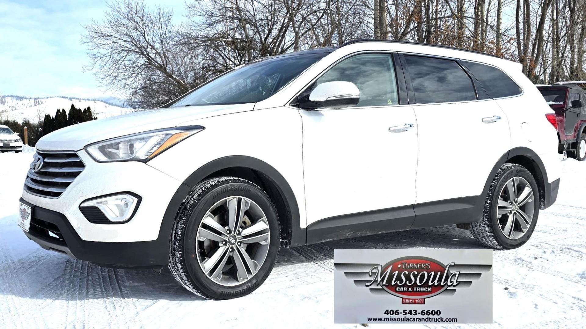 2013 White /Brown Hyundai Santa Fe Limited AWD (KM8SRDHF2DU) with an 3.3L V6 DOHC 24V engine, 6-Speed Automatic transmission, located at 450 N Russell, Missoula, MT, 59801, (406) 543-6600, 46.874496, -114.017433 - Nice One Owner AWD SUV. Clean Carfax. 3.3L V6 Engine. All Wheel Drive. Beautiful Brown Leather Interior. Heated Power Seats. Panoramic Sunroof. Heated Middle Seats. 3rd Row Seating. Infinity Sound System. AM FM XM CD Player. Navigation. Backup Camera. Heated Steering Wheel. Bluetooth Phone and Audio - Photo#0